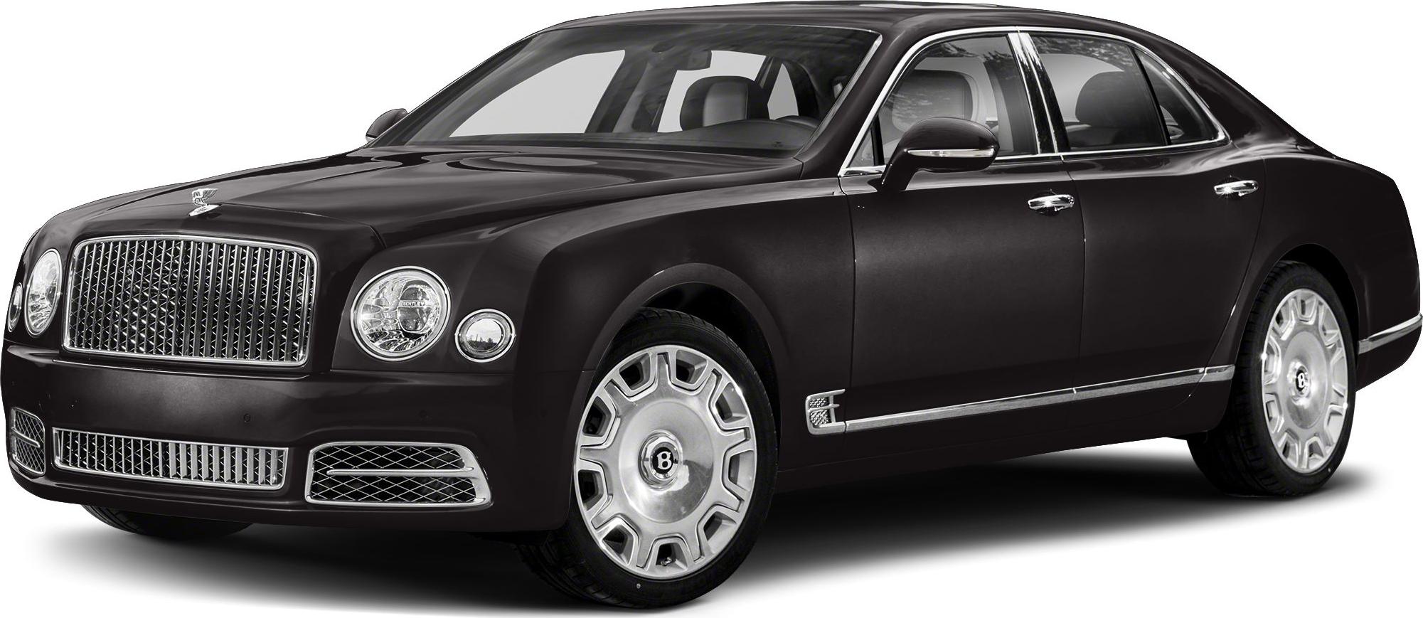Front side view of luxury sedan with prominent grille and round headlights