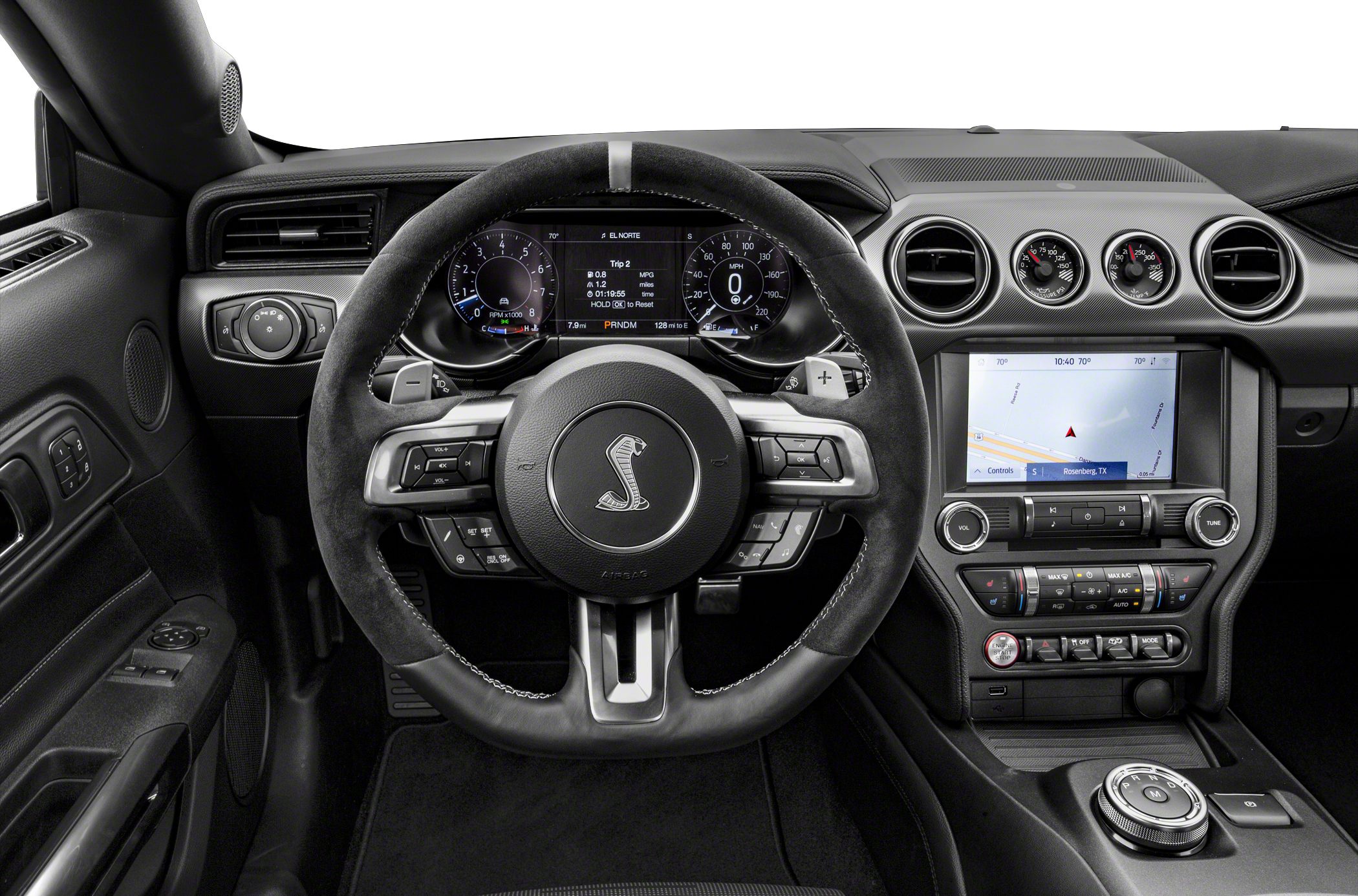 Steering wheel with Shelby emblem, digital dashboard, infotainment screen, and control buttons.