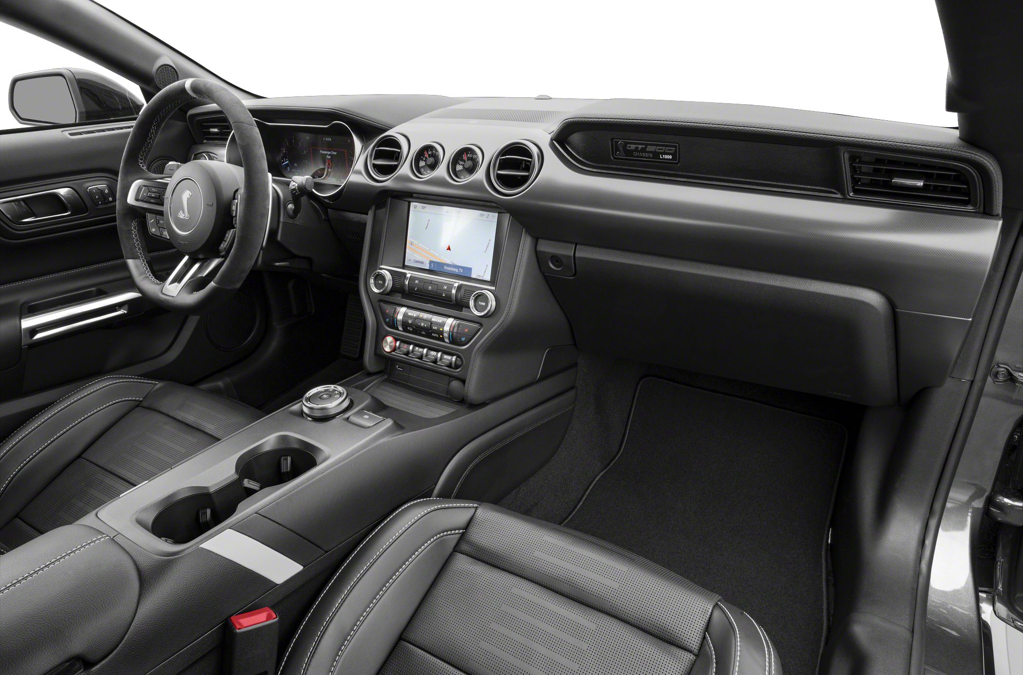 Sporty dashboard with navigation screen and premium perforated leather seats.