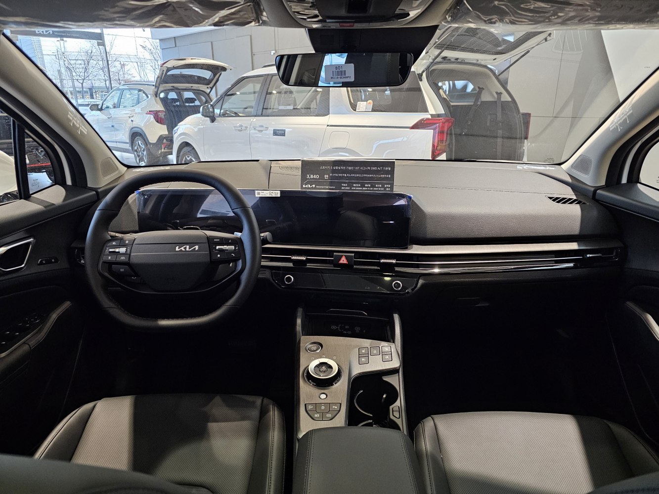 Digital dashboard and multi-function steering wheel in modern car interior
