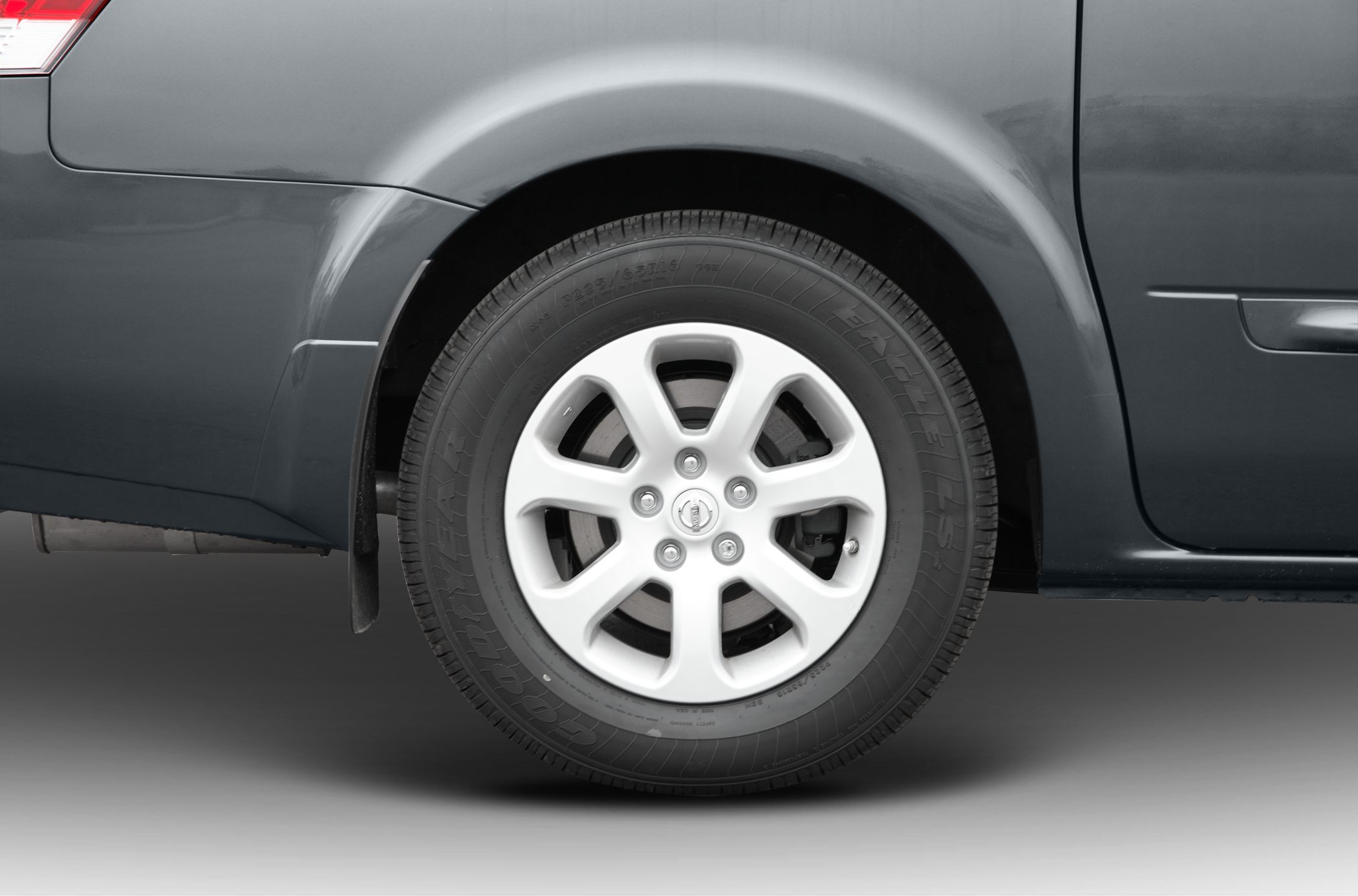 Close-up of alloy wheel and Goodyear tire on vehicle rear side