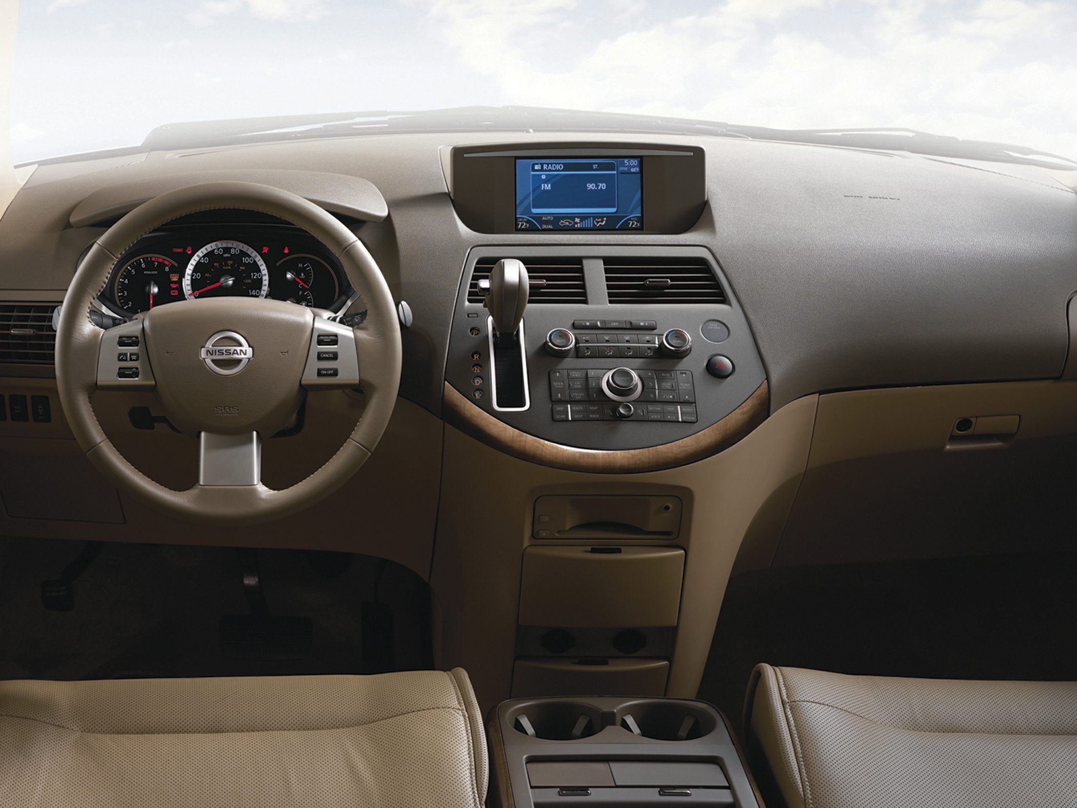 Dashboard and steering wheel with integrated control panel and infotainment screen