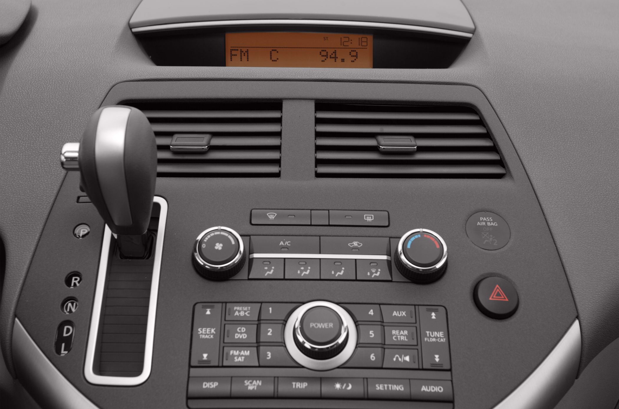 Center console with gear shift and climate controls