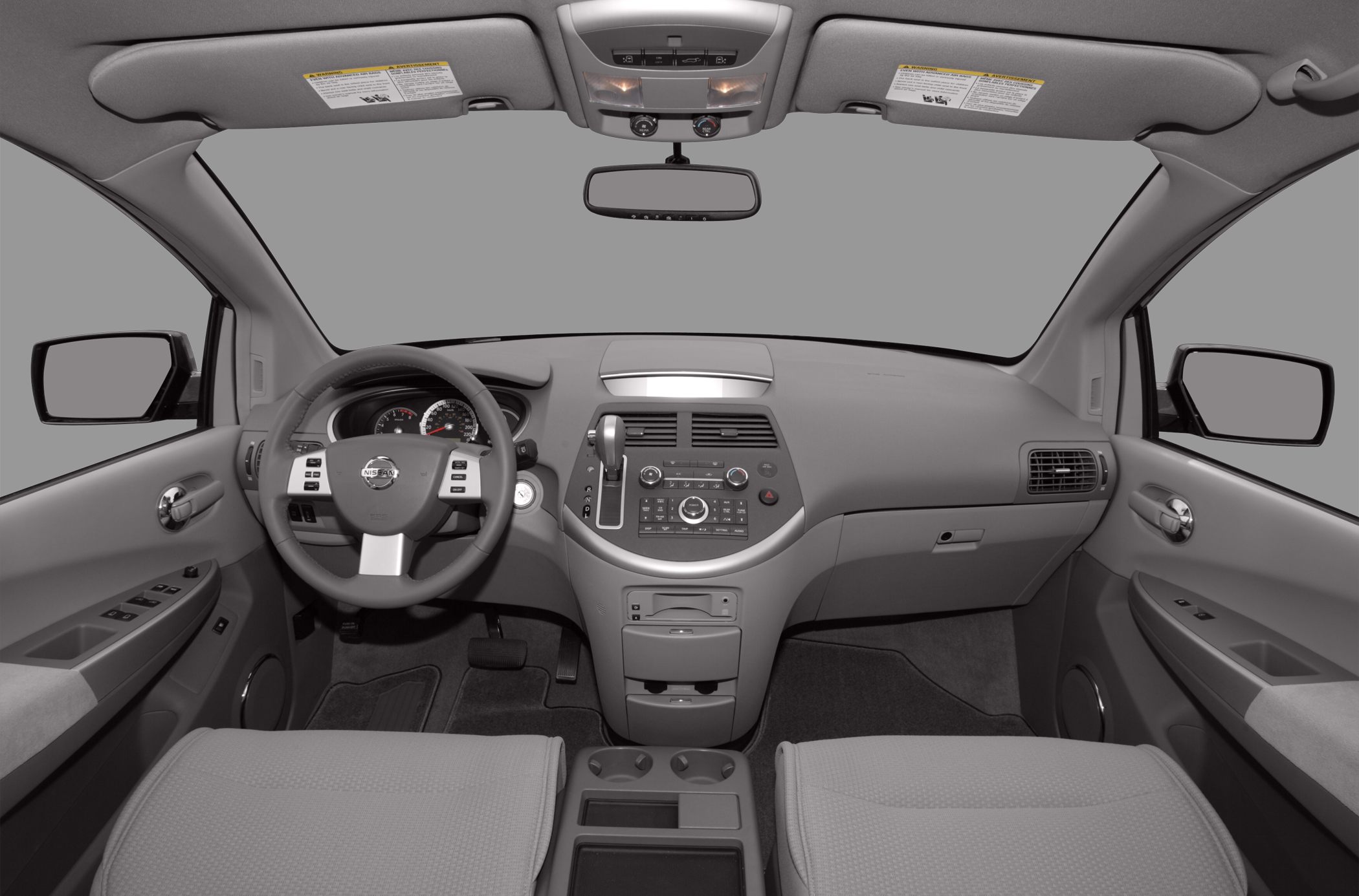 Interior view showing dashboard, steering wheel, and center console