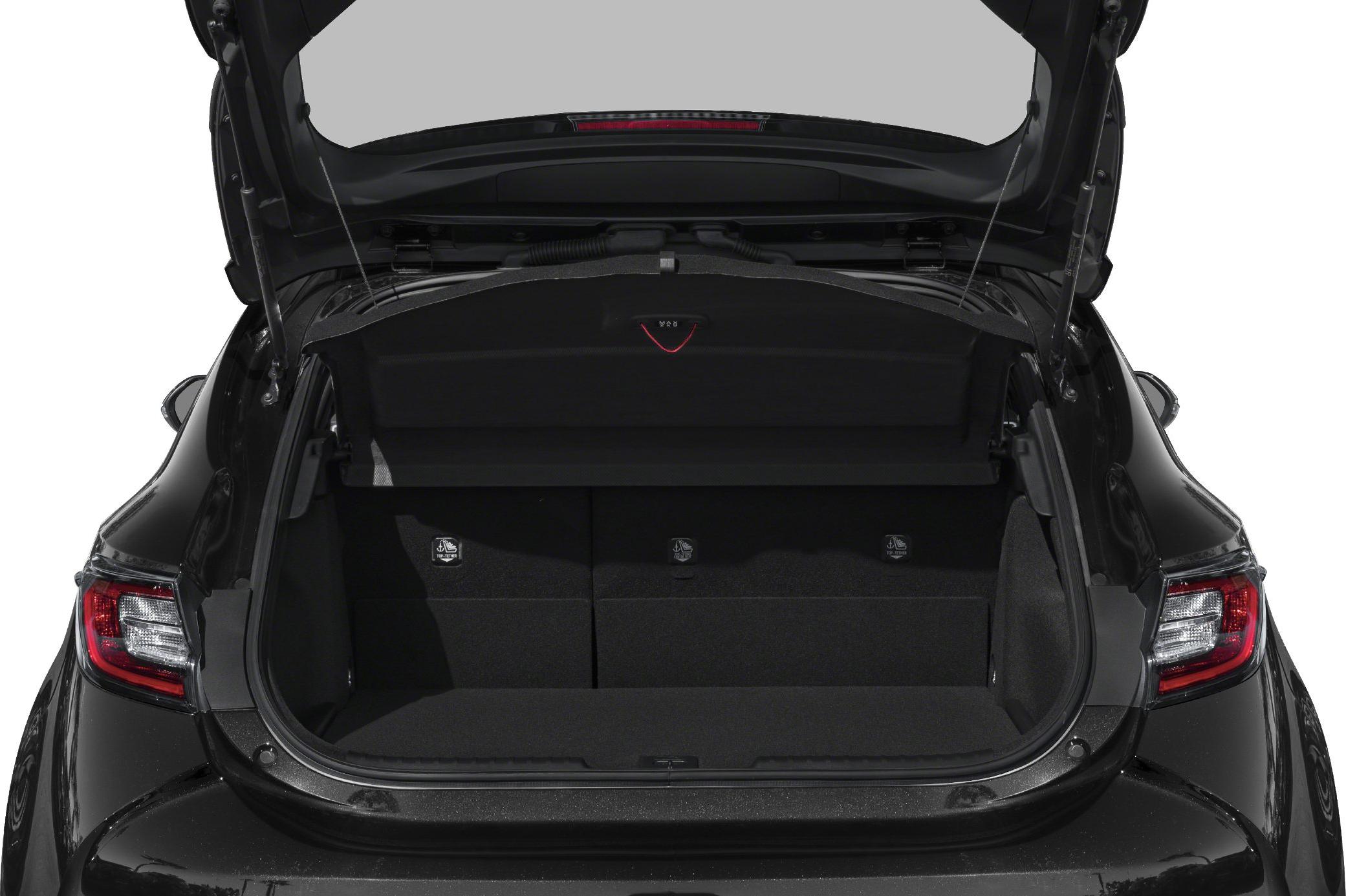 Open rear cargo space with foldable rear seats and spacious trunk area.