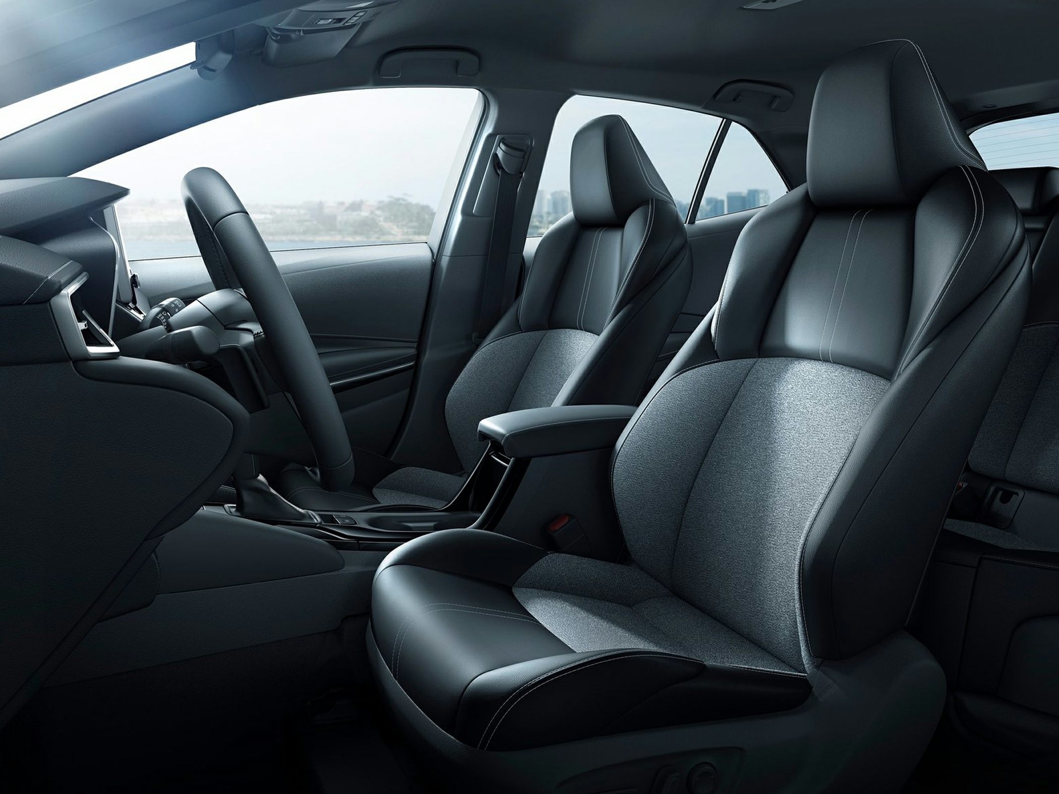 Ergonomic front seats and modern cabin design with fabric and leather upholstery