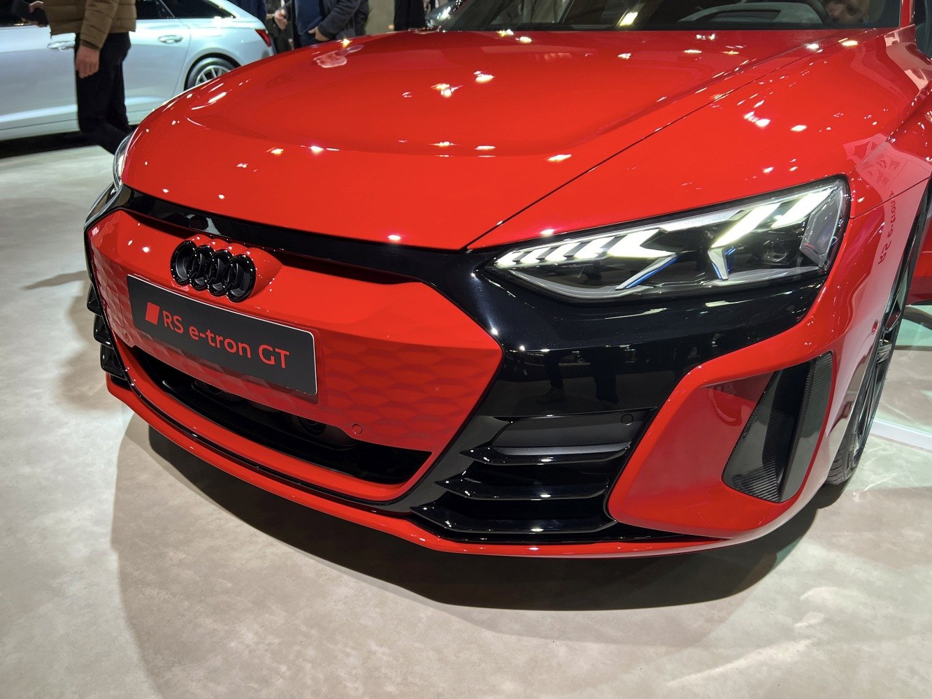 Front bumper and LED headlights close-up with aggressive styling