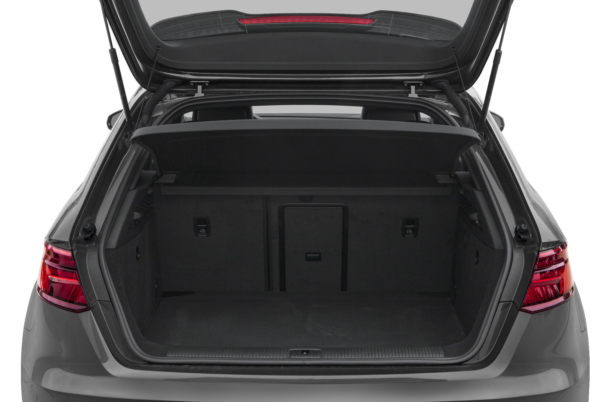 Open hatchback trunk showcasing spacious cargo area and rear taillights