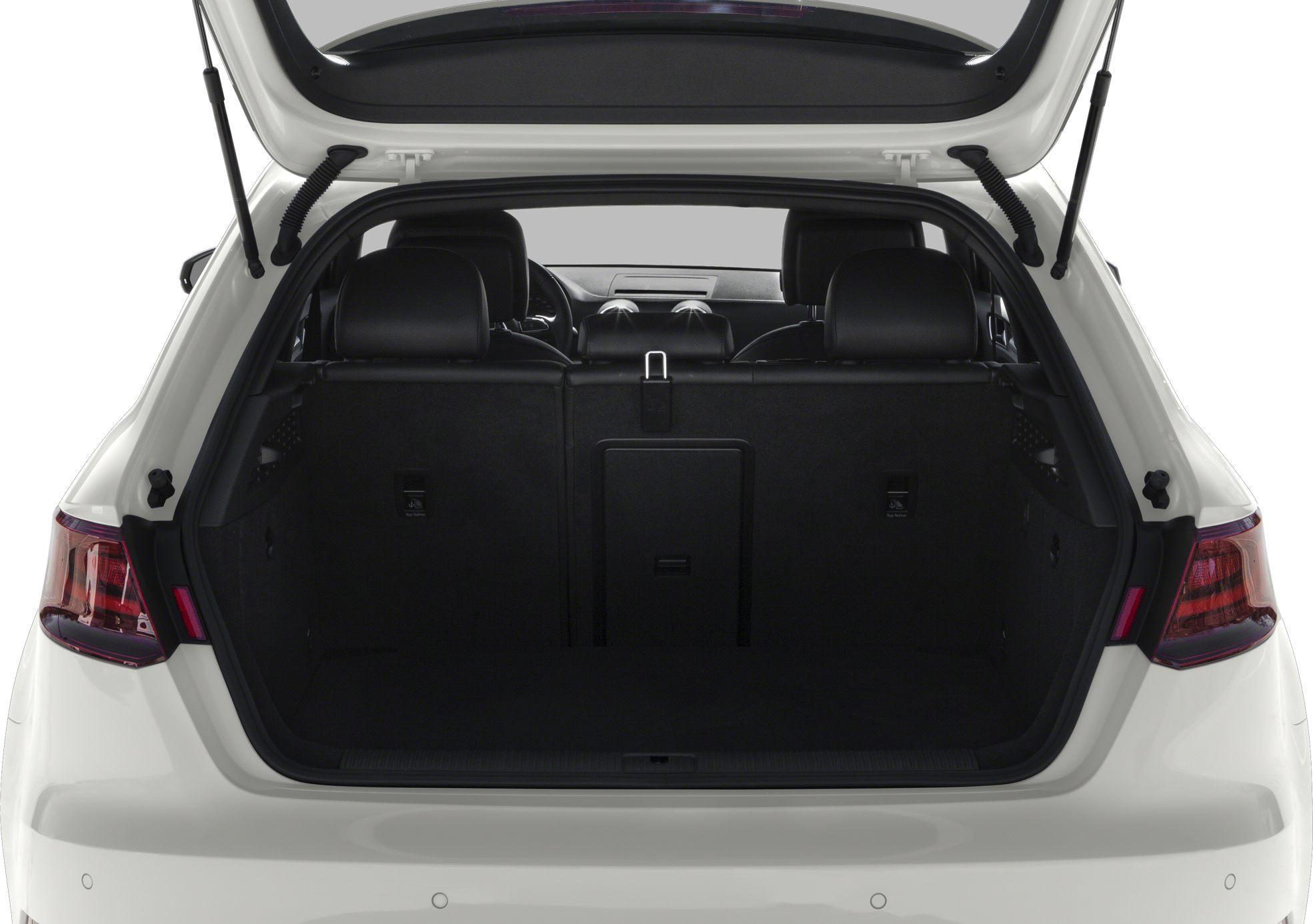 Spacious rear hatch trunk interior with foldable rear seats and black upholstery