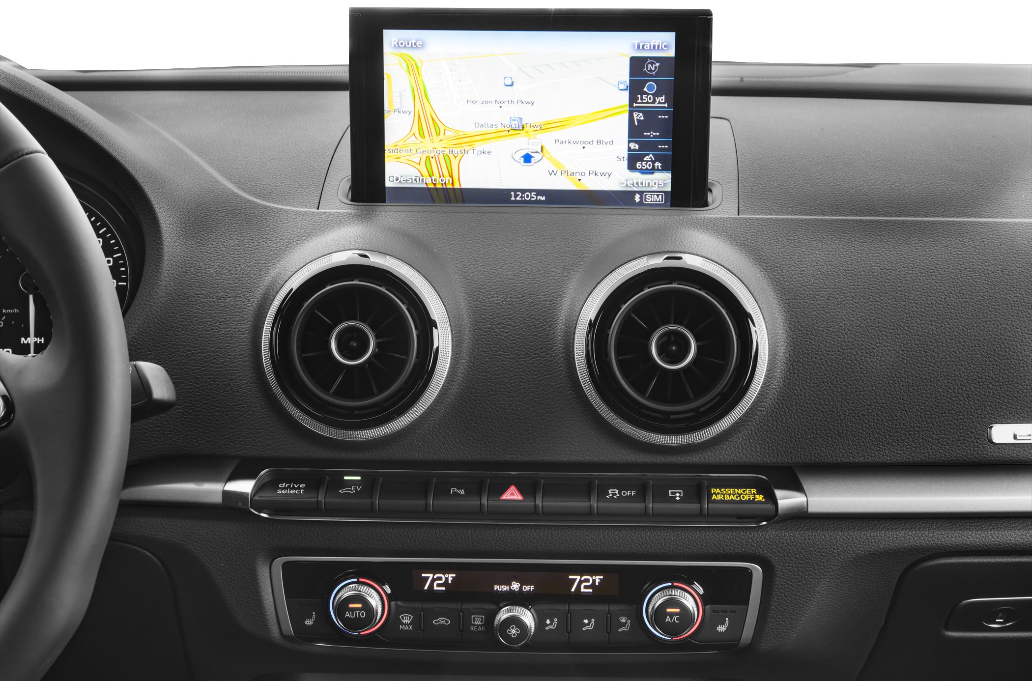 Dual circular air vents, pop-up infotainment screen, digital climate control panel