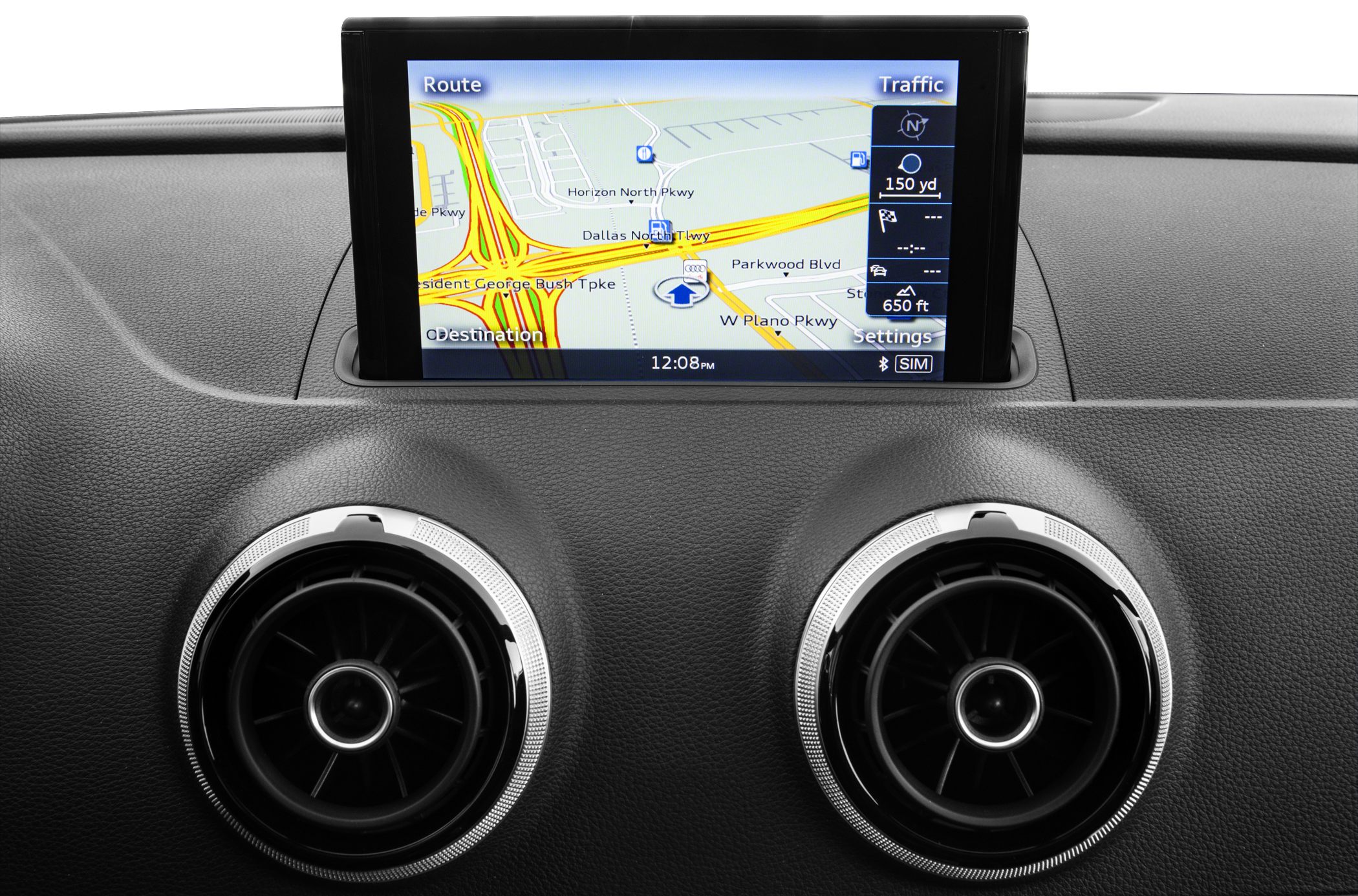 Built-in navigation display with dual circular air vents on textured dashboard