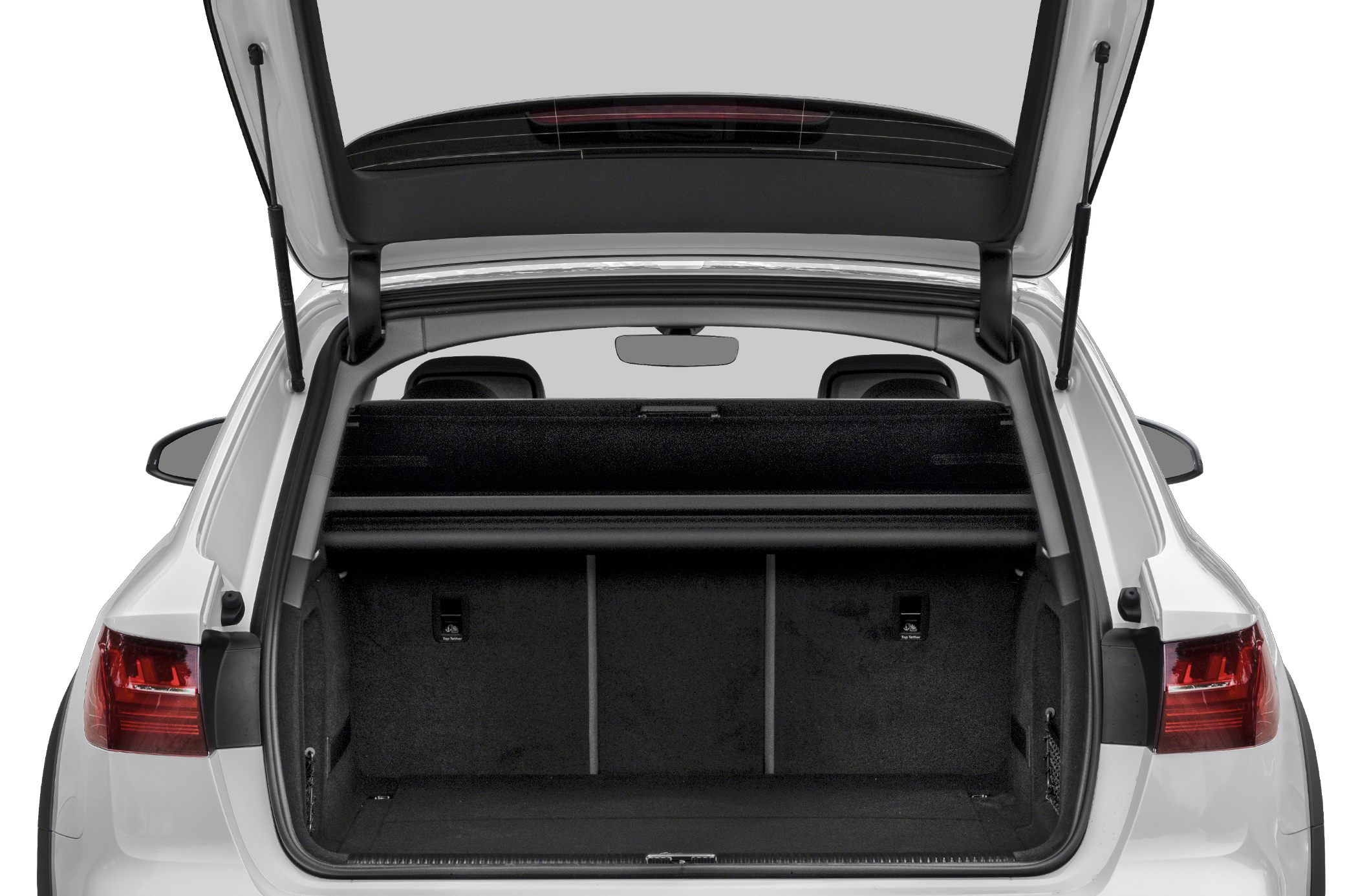 Open trunk cargo space with rear seats and parcel shelf visible
