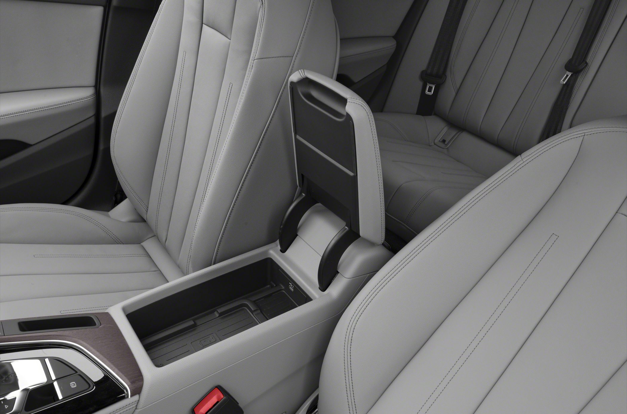 Leather front seats with open center armrest storage compartment