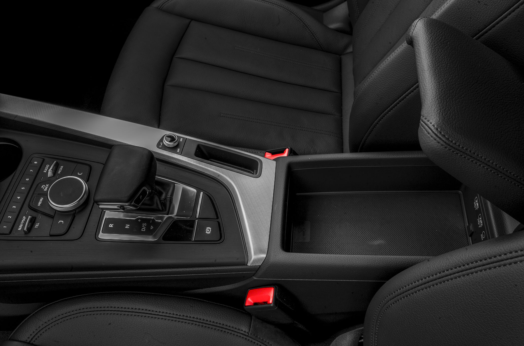 Audi A4 Avant B9 facelift center console with gear shifter and control panel.