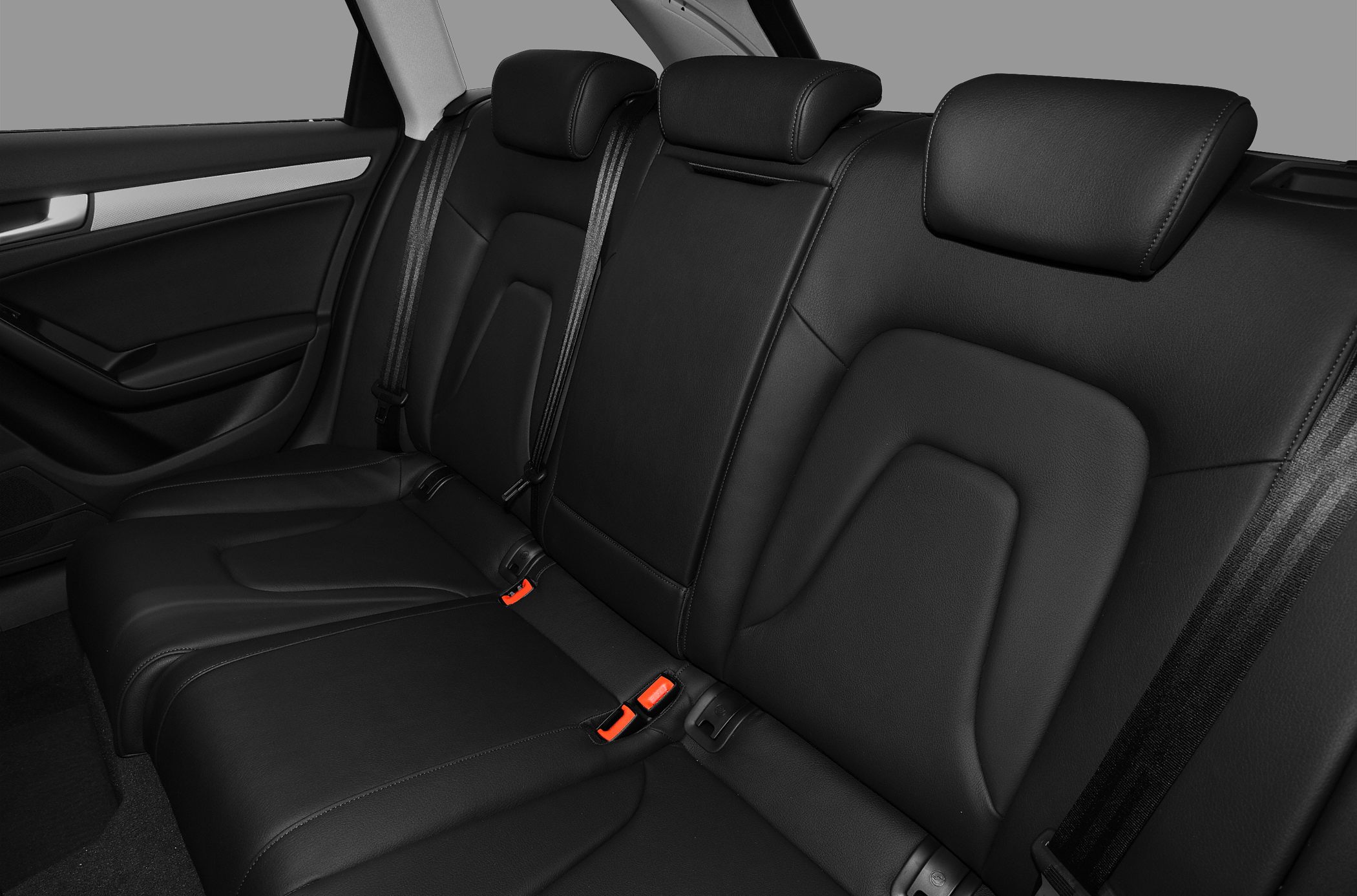 Black leather rear seats with headrests and seatbelts