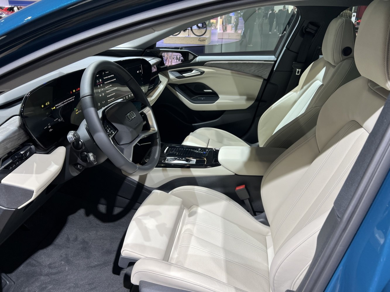 Modern digital instrument cluster and luxurious beige leather seats