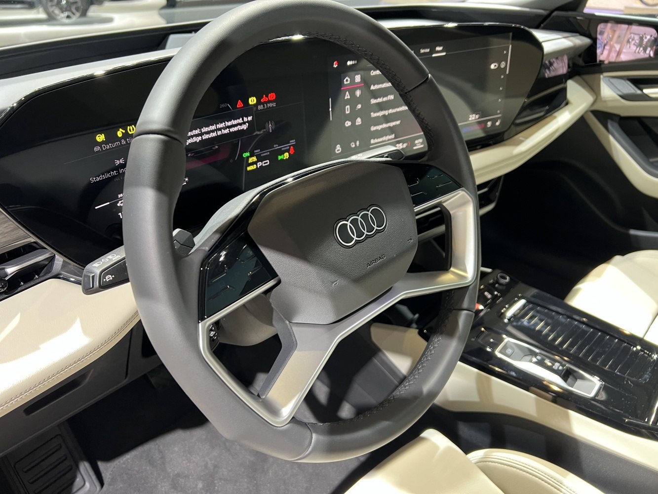 Digital cockpit and multifunction steering wheel in beige luxury interior