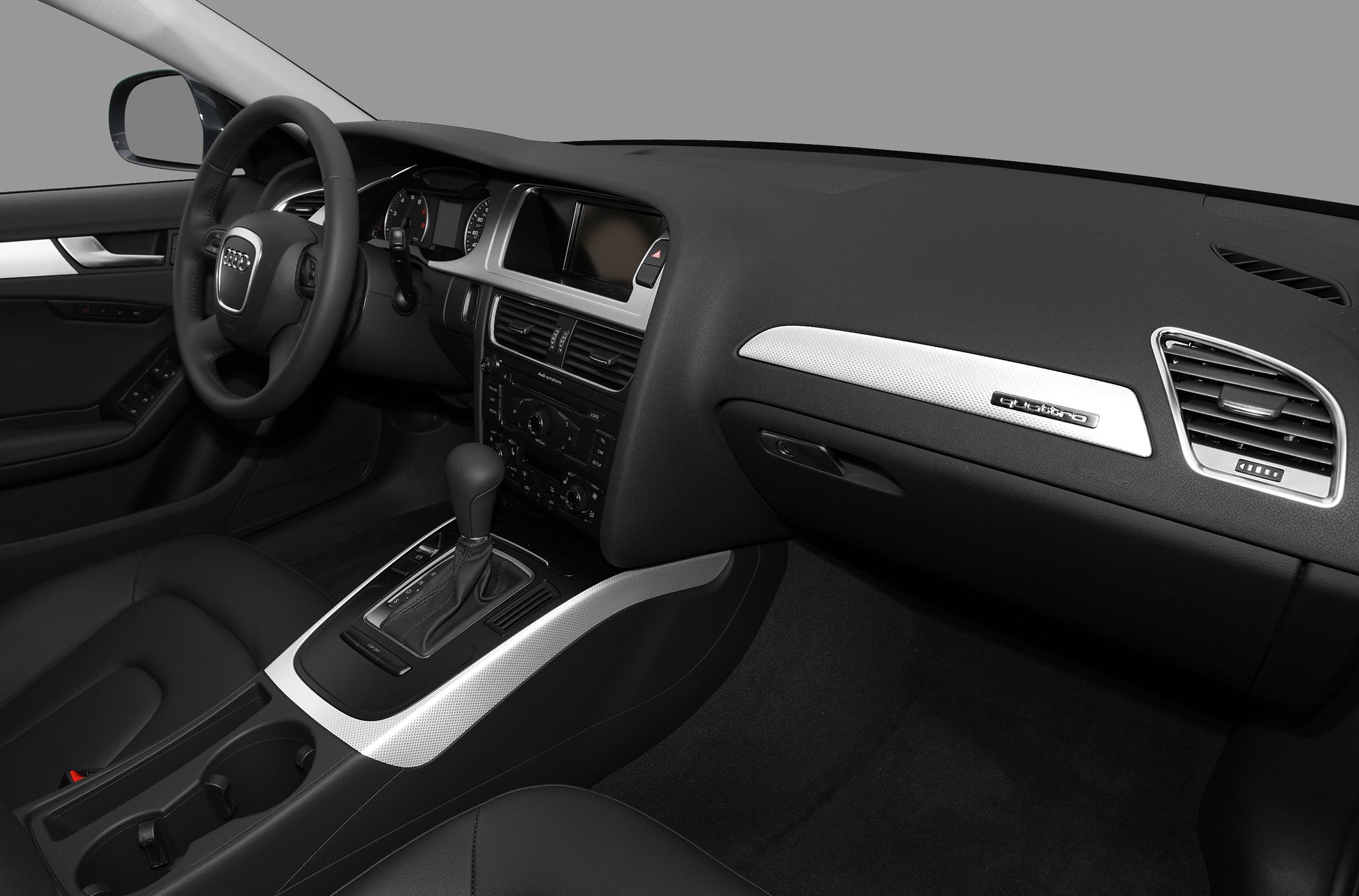 Car interior with dashboard, center console, and gearshift