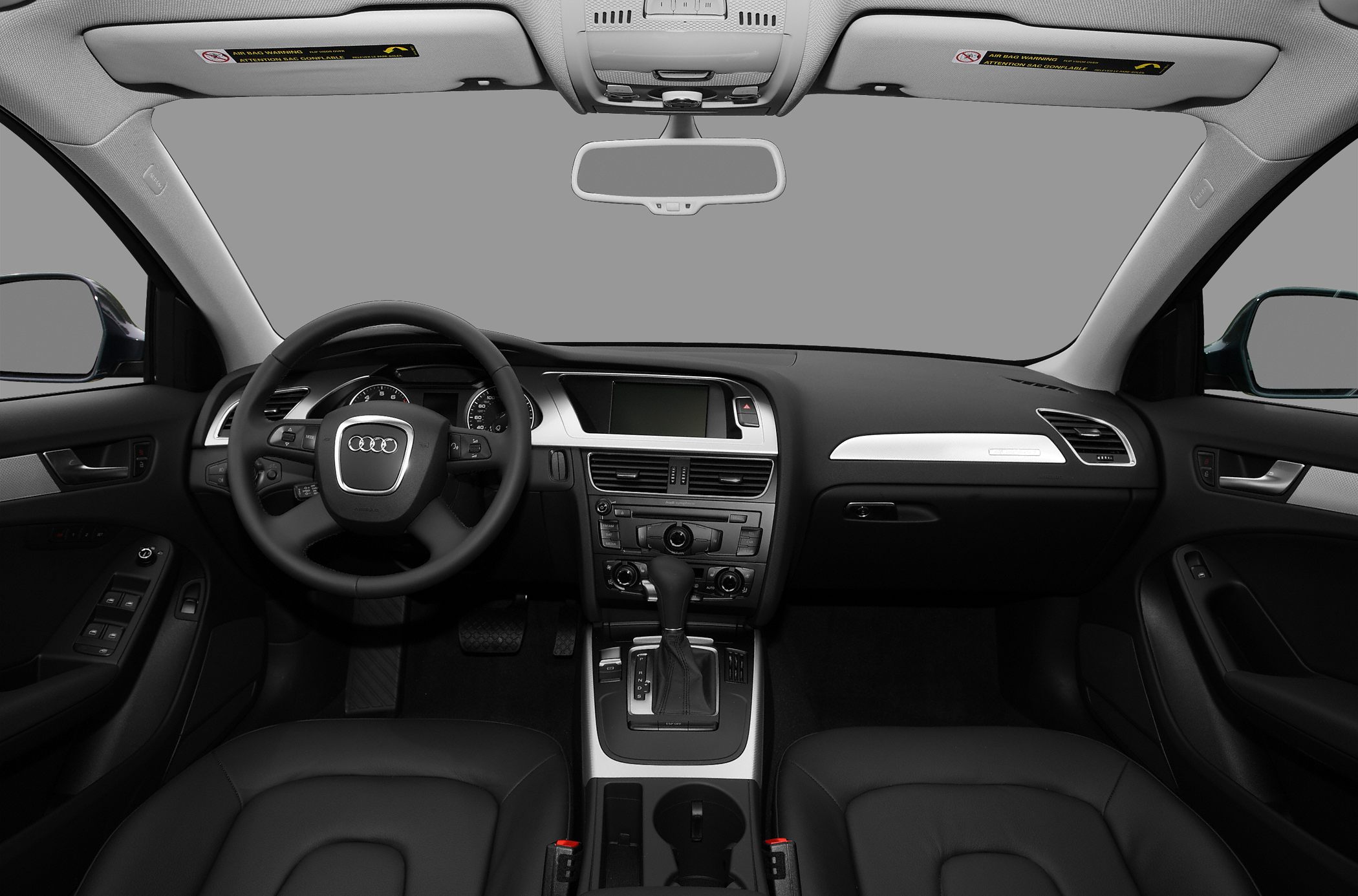 Steering wheel, dashboard, and center console view with automatic gear shift