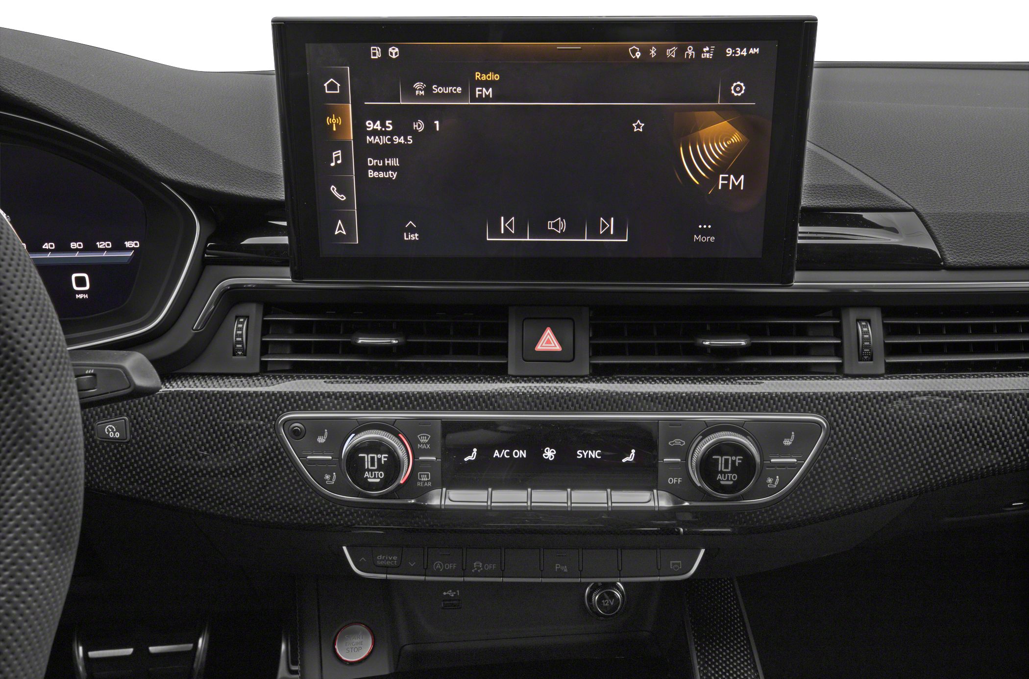 Car dashboard with large multimedia screen and digital climate control.
