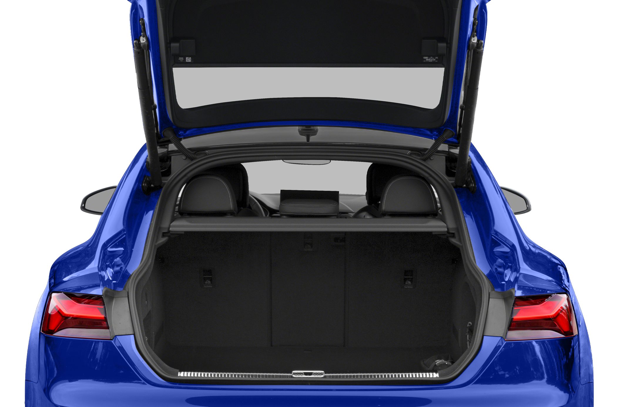 Open rear trunk with visible rear seats and spacious cargo area