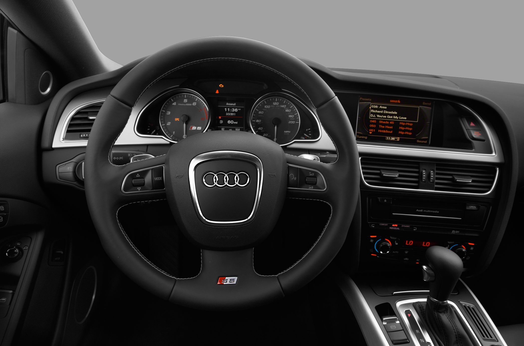 Steering wheel, instrument cluster, and center console interior view