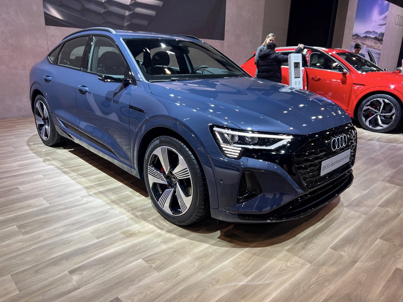 Sleek front and side view with modern headlights and aerodynamic design