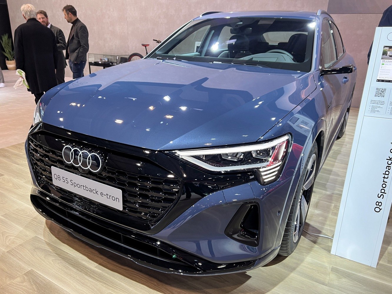 Front view with LED headlights and black glossy grille