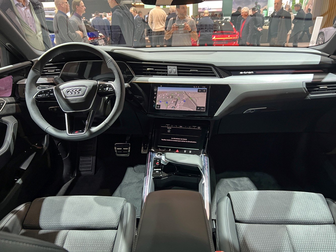 Digital dashboard and touchscreen infotainment with sporty steering wheel