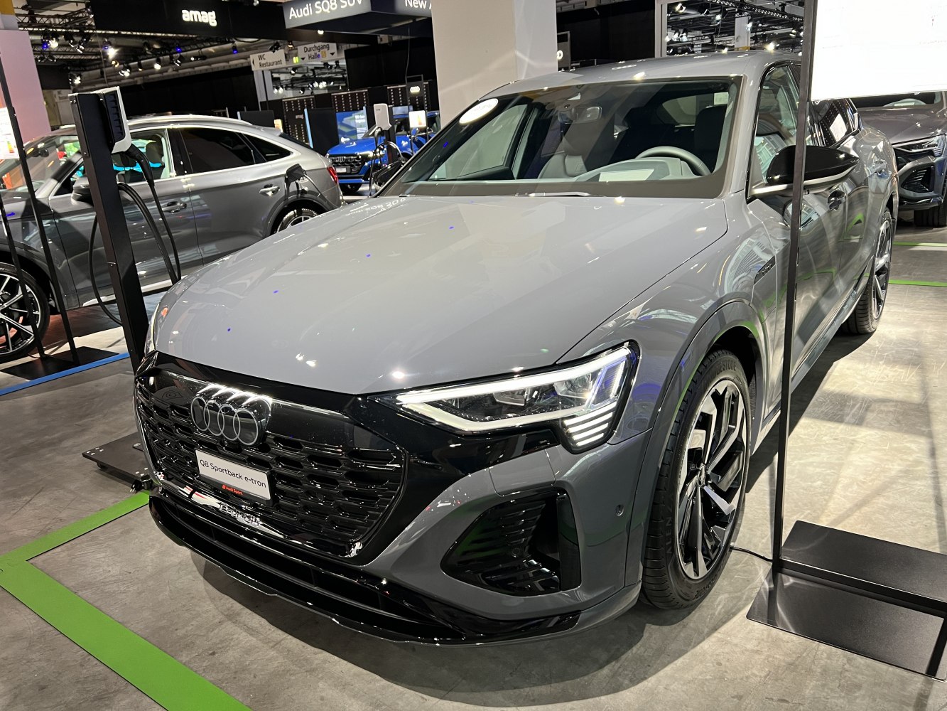 Electric luxury SUV with sportback design and LED headlights