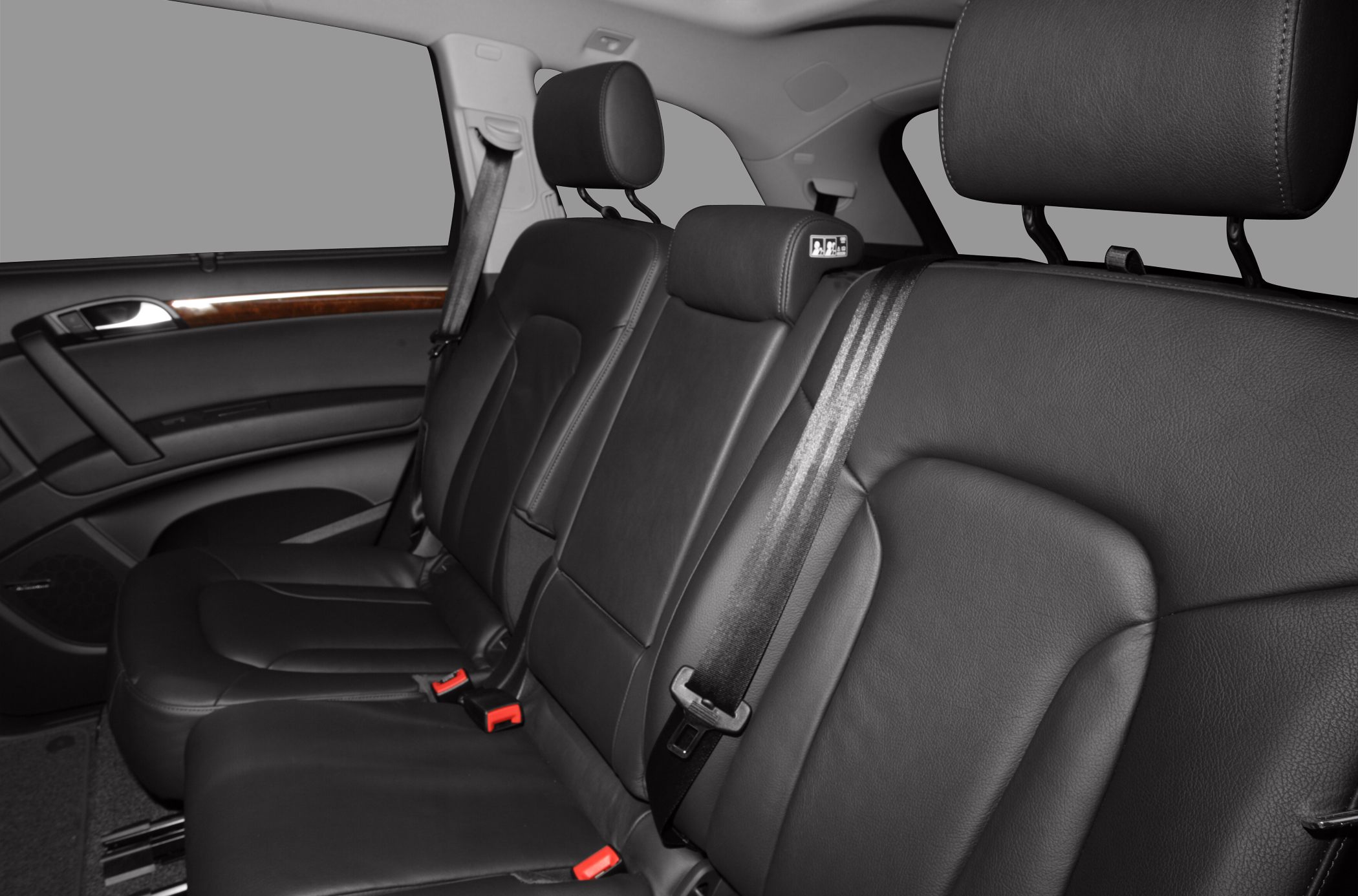 Black leather rear seats with headrests and seat belts