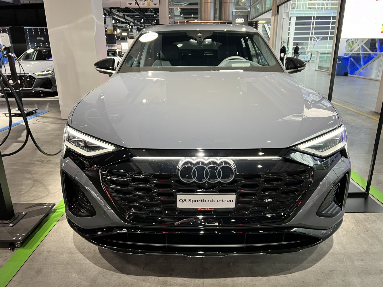 Front view with LED headlights and black honeycomb grille