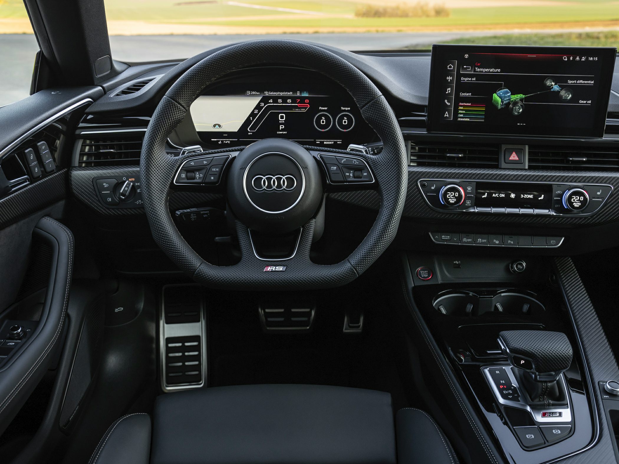 Steering wheel with RS badge, digital instrument cluster, infotainment screen