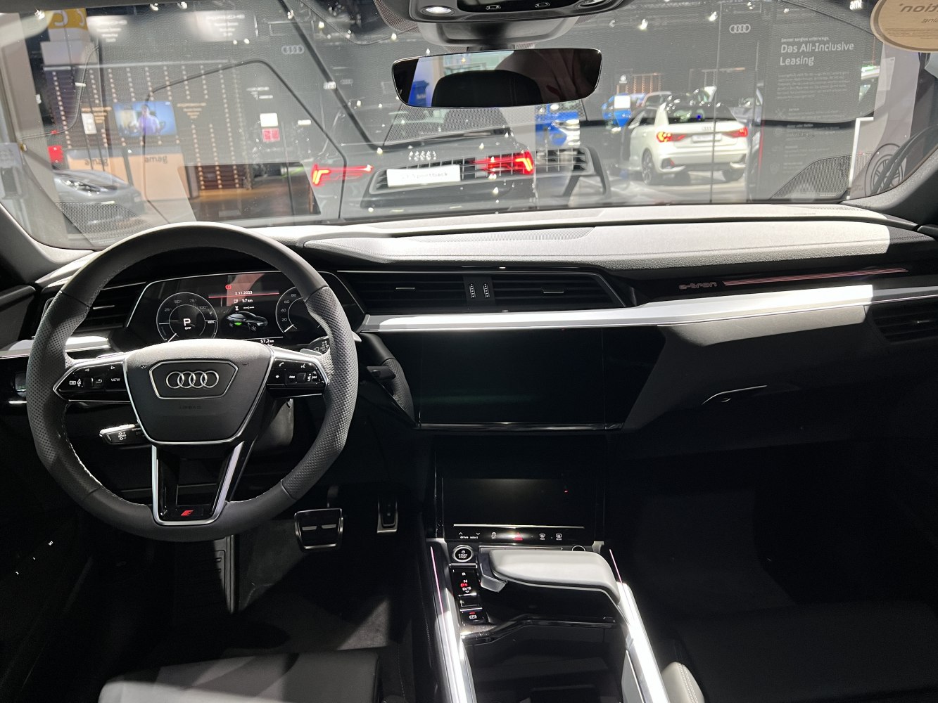 Digital cockpit and touchscreen controls in luxury EV interior