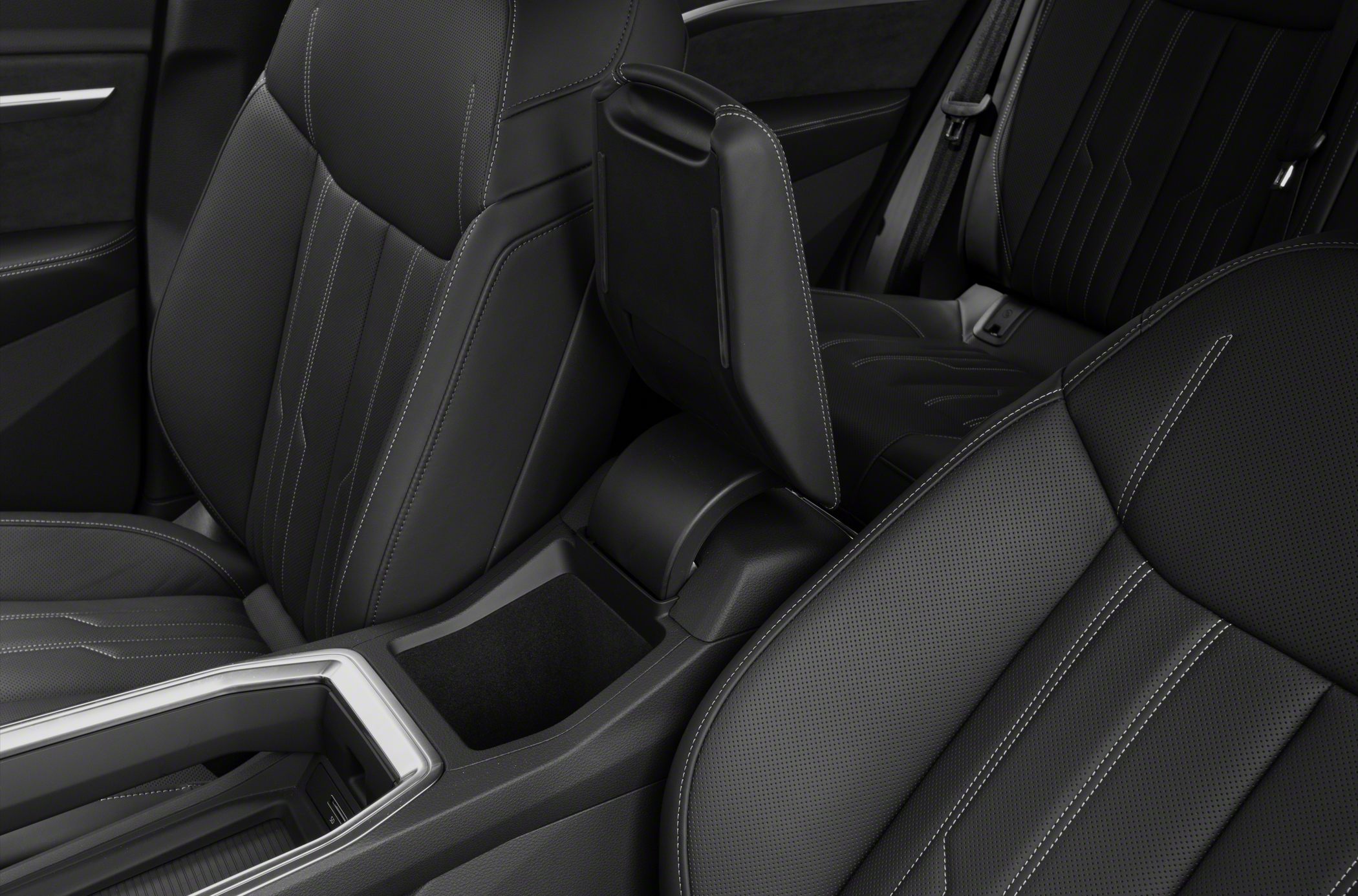 Leather seats with contrast stitching and center console storage compartment