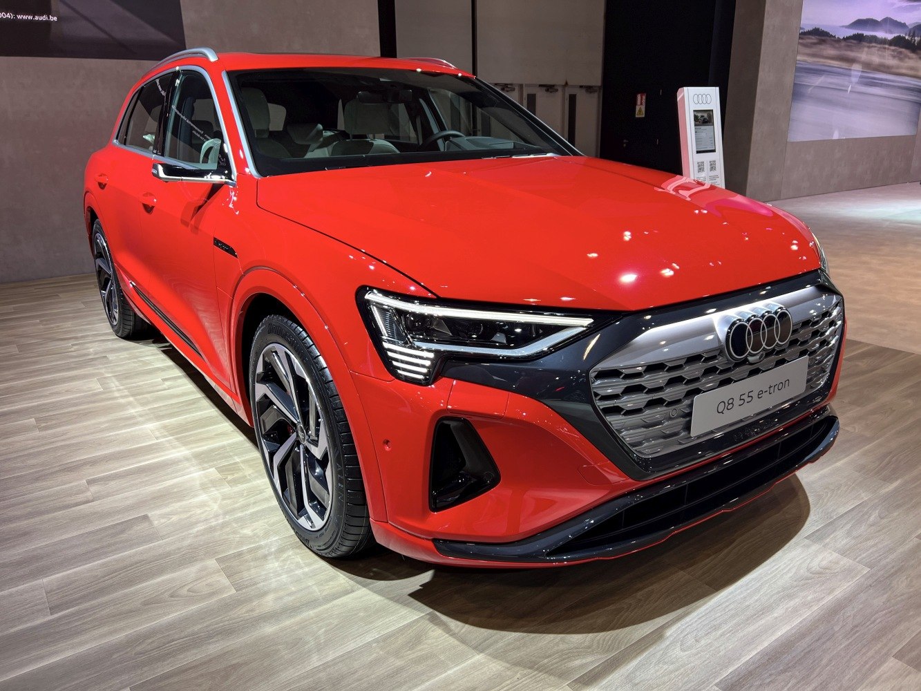 Electric SUV front with LED headlights and hexagonal grille