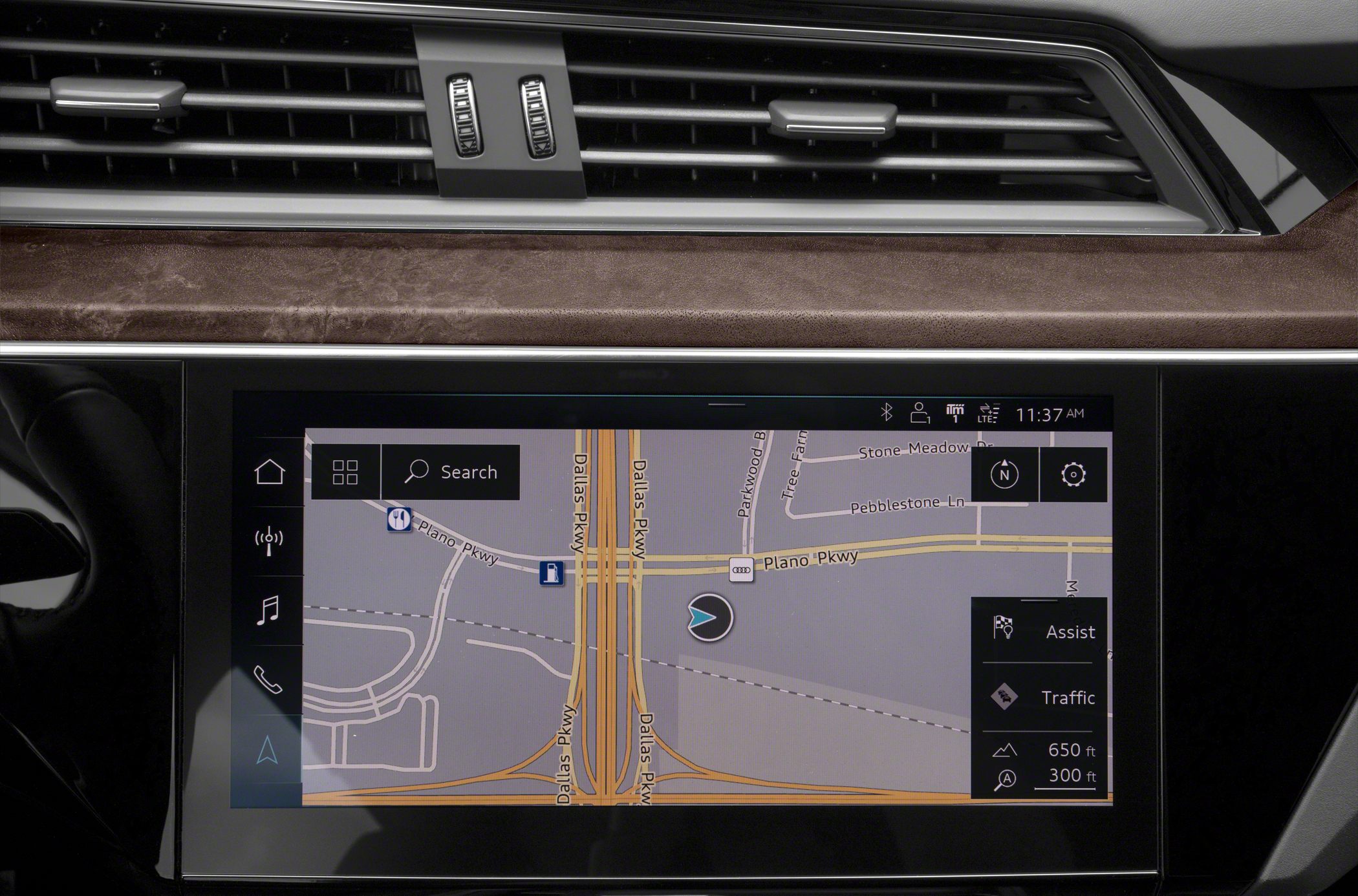 Navigation system display with map and traffic assist controls