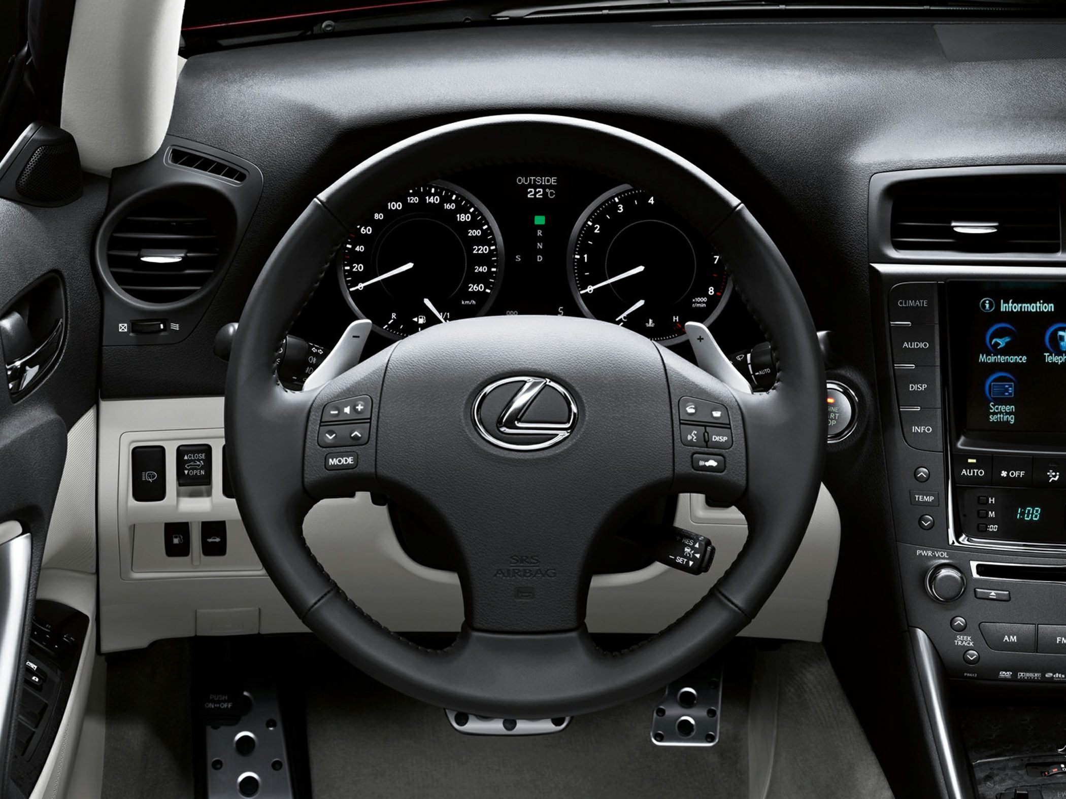 Steering wheel and dashboard with instrument cluster and controls