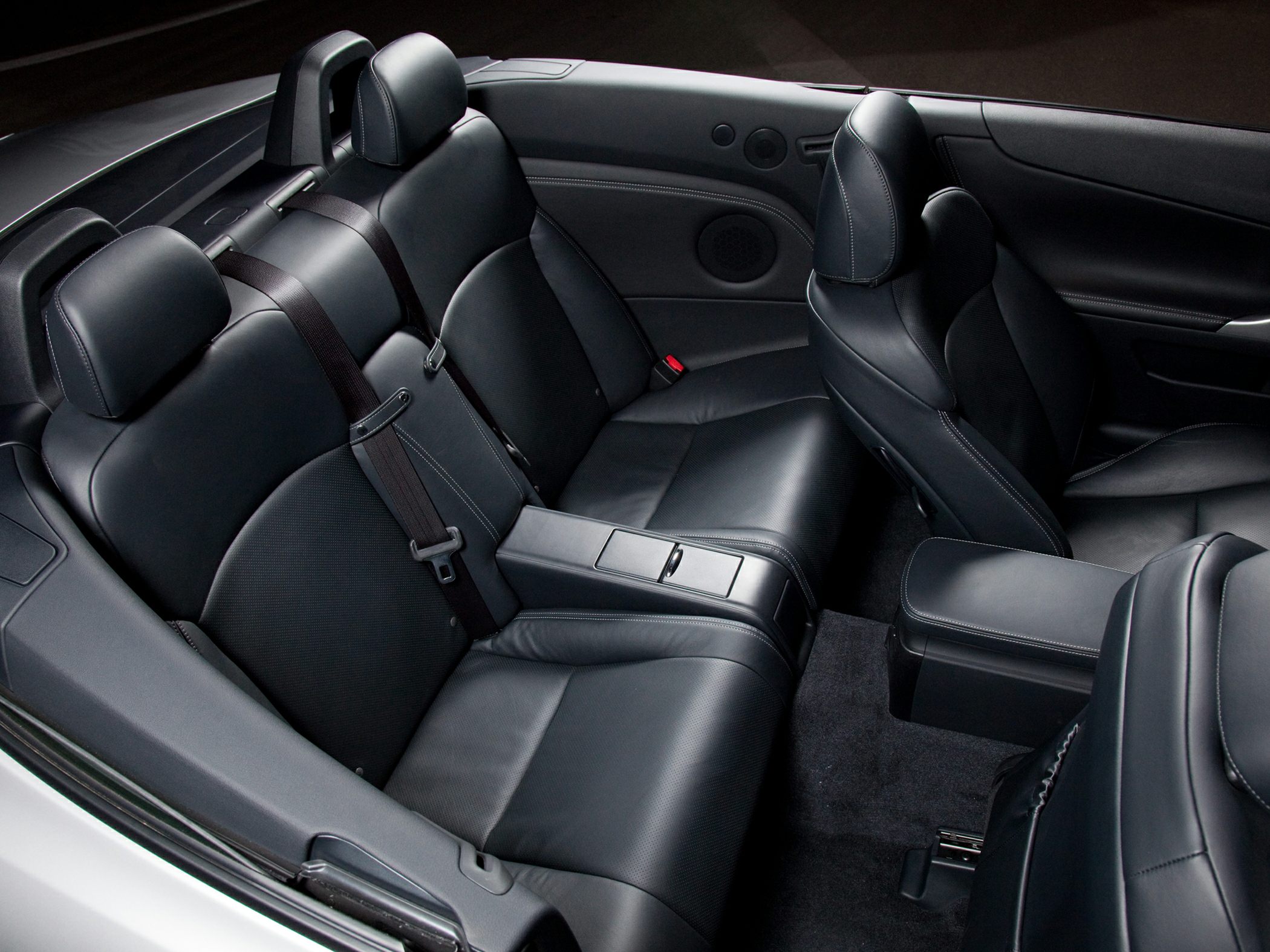 Black leather rear seats with seat belts and center armrest