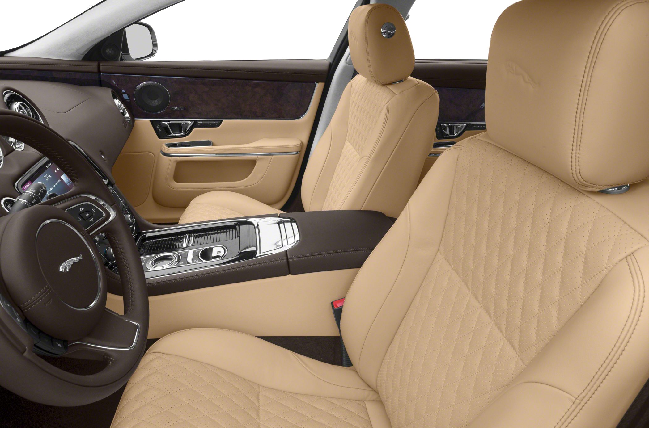 Luxury beige leather seats with diamond stitching and wood trim dashboard