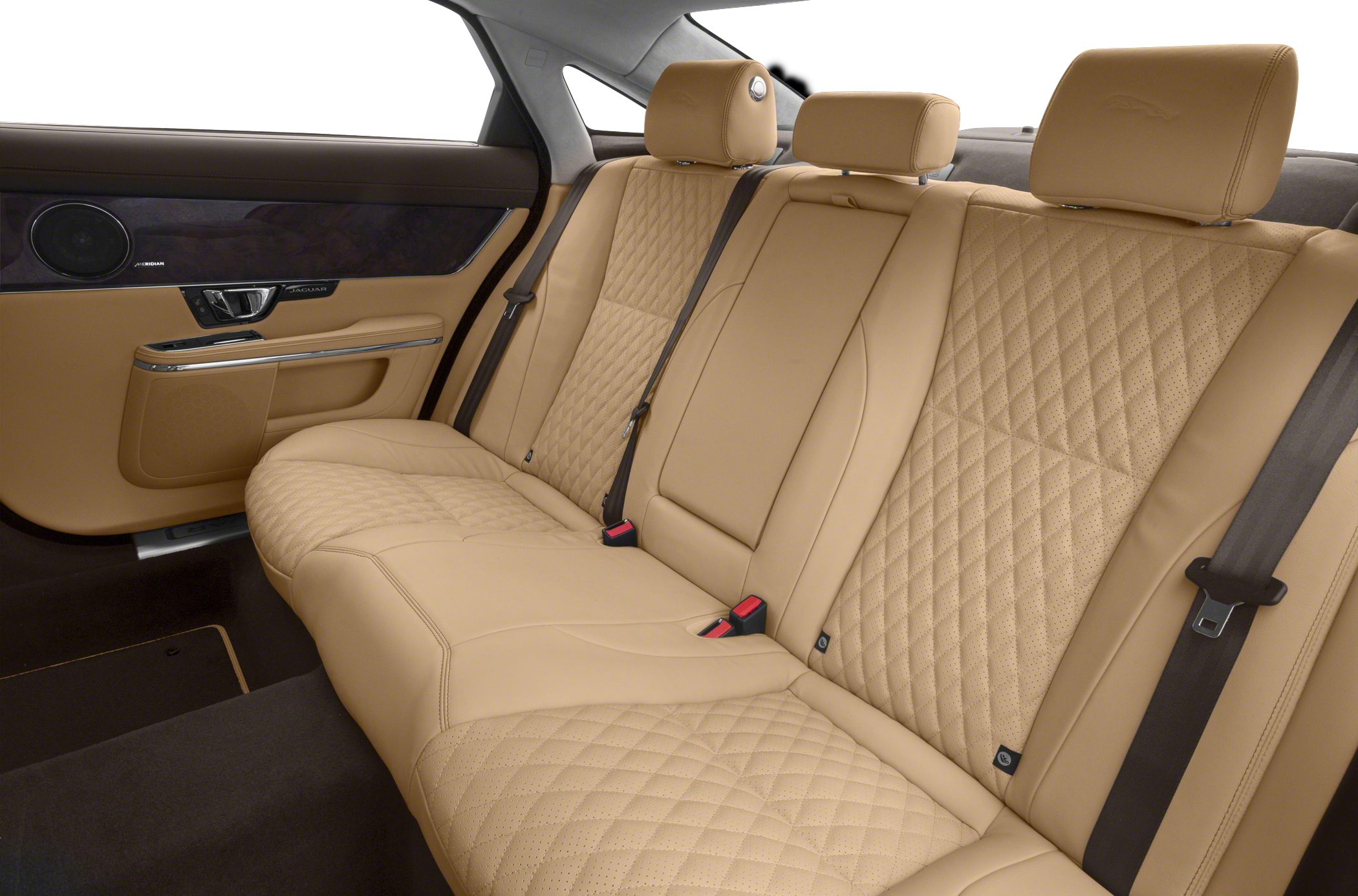 Tan leather rear seat with diamond stitching and luxury finishes