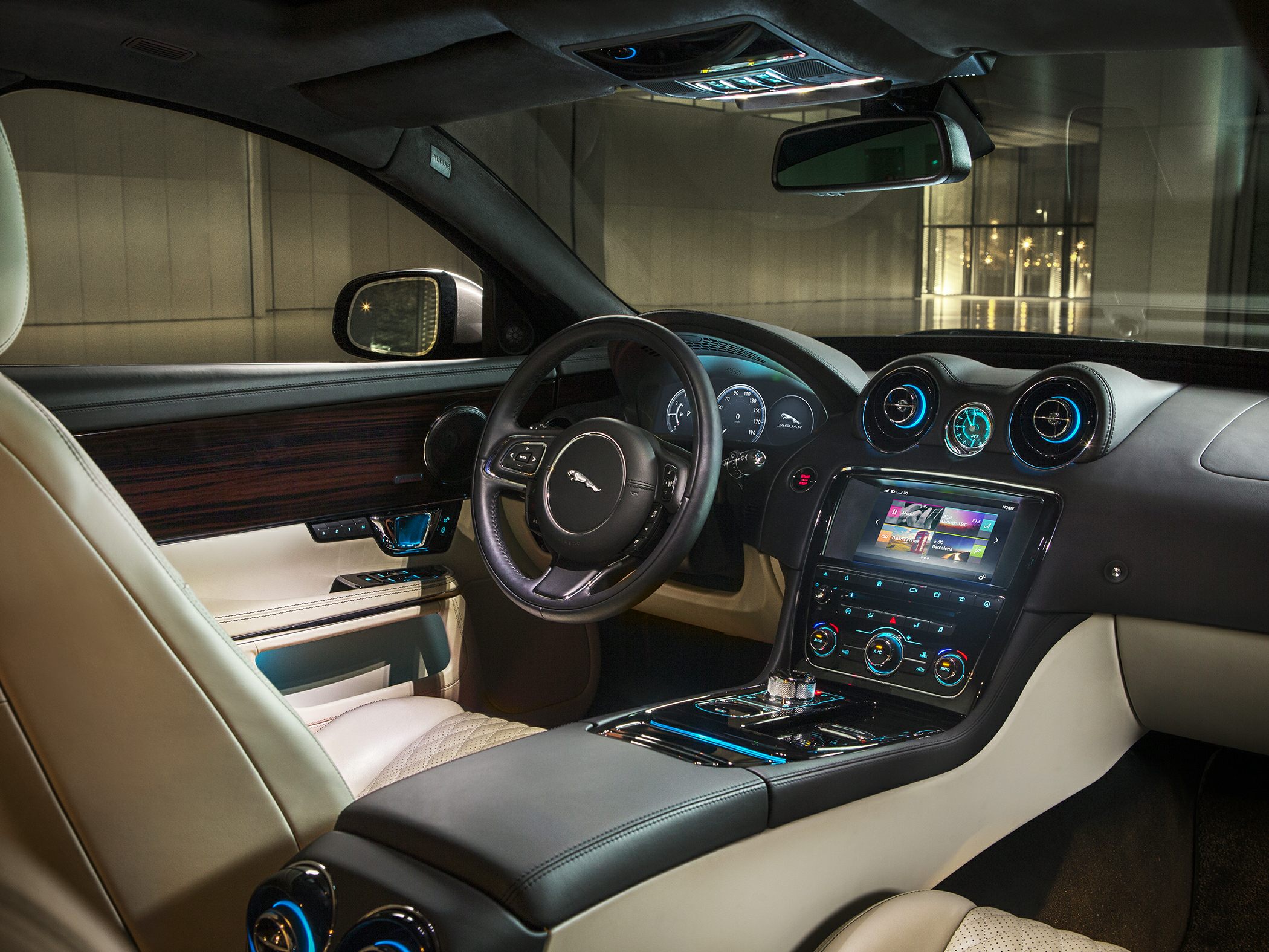 Luxury car interior with leather seats, digital dashboard, and touchscreen controls