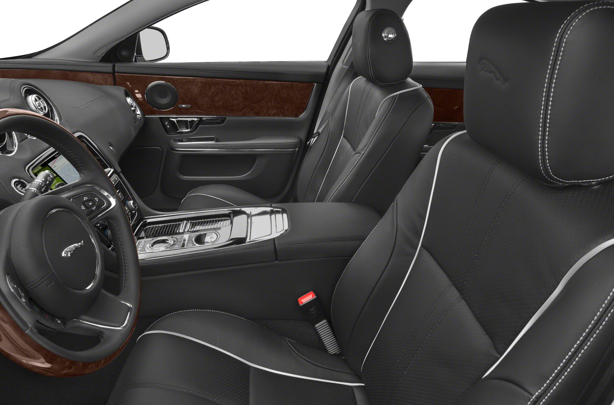Luxury car interior with leather seats, wood trim, and detailed stitching