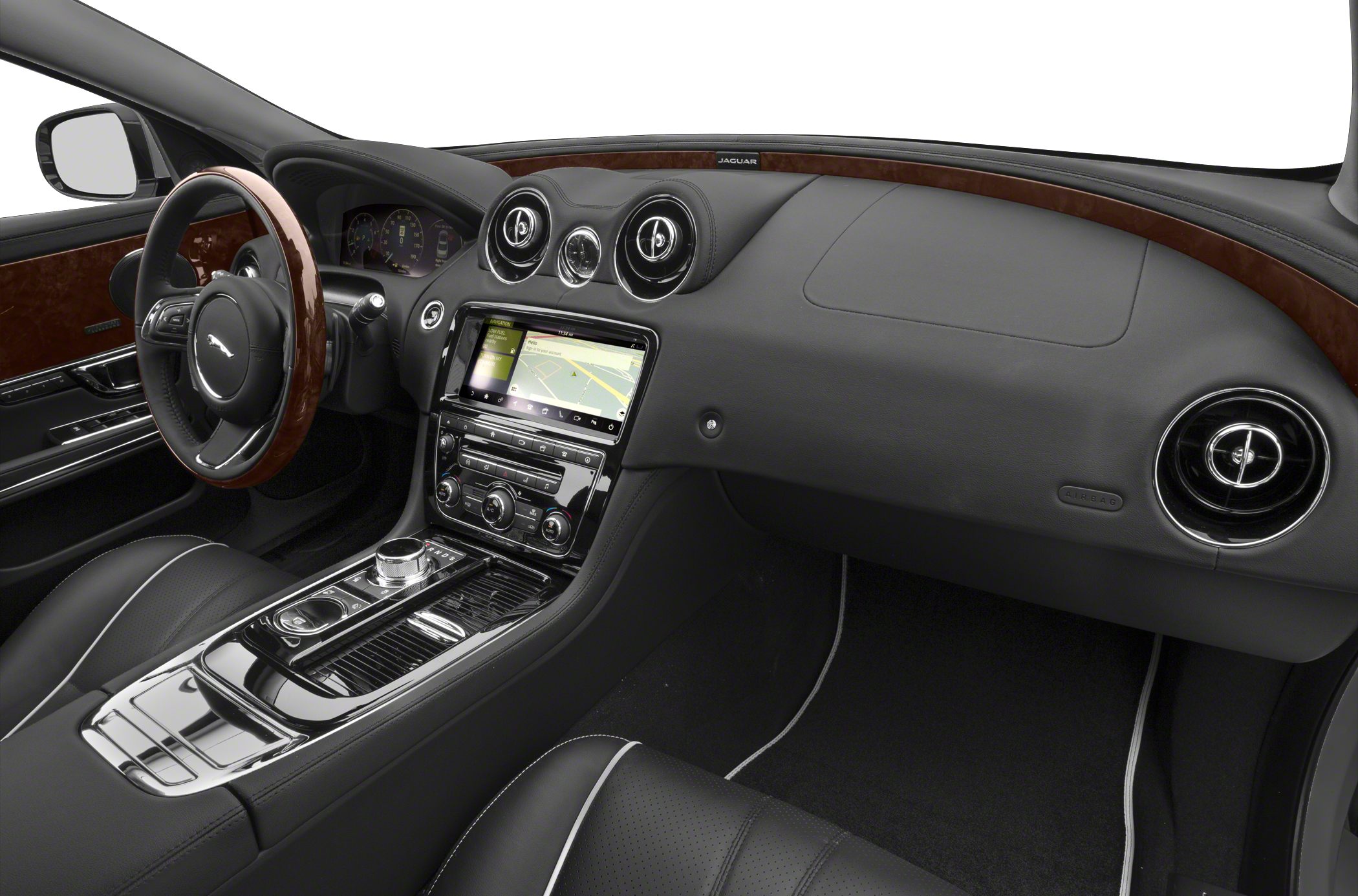 Luxury interior with wood trim and modern dashboard controls