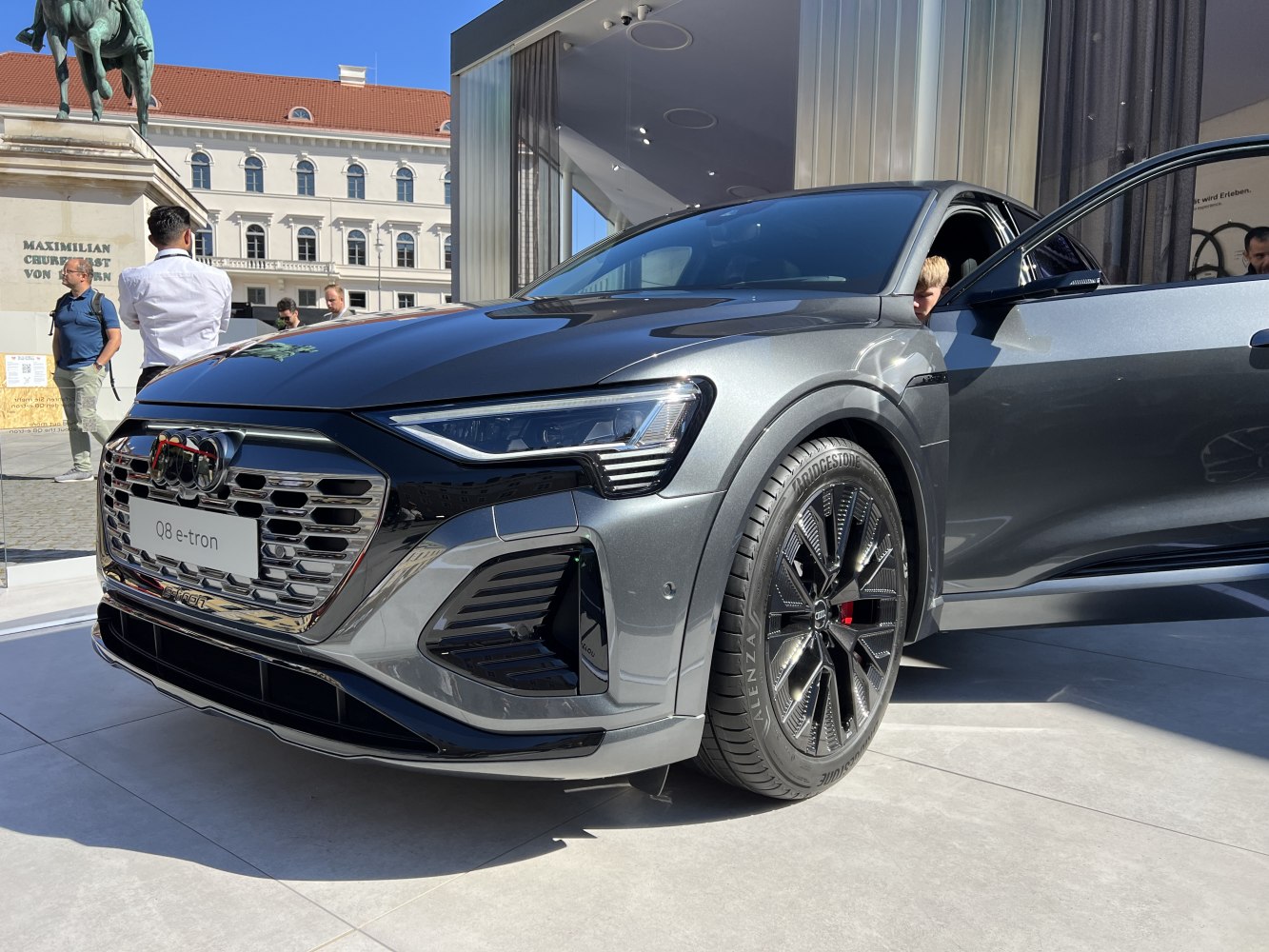 Front grille and LED headlights of a modern electric SUV