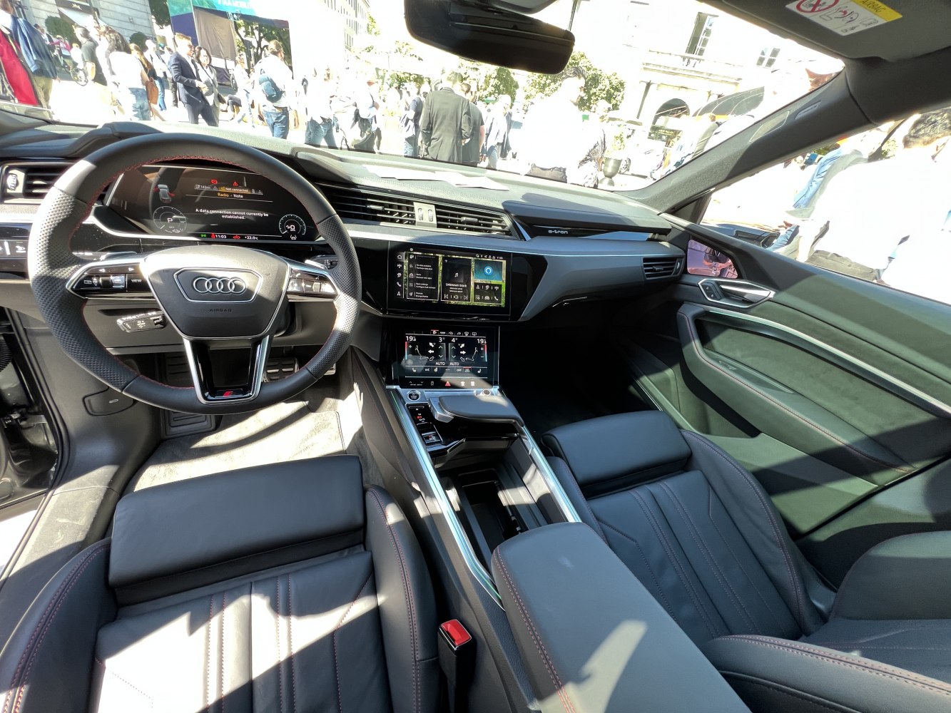 Digital cockpit, dual touchscreen display, premium leather seating