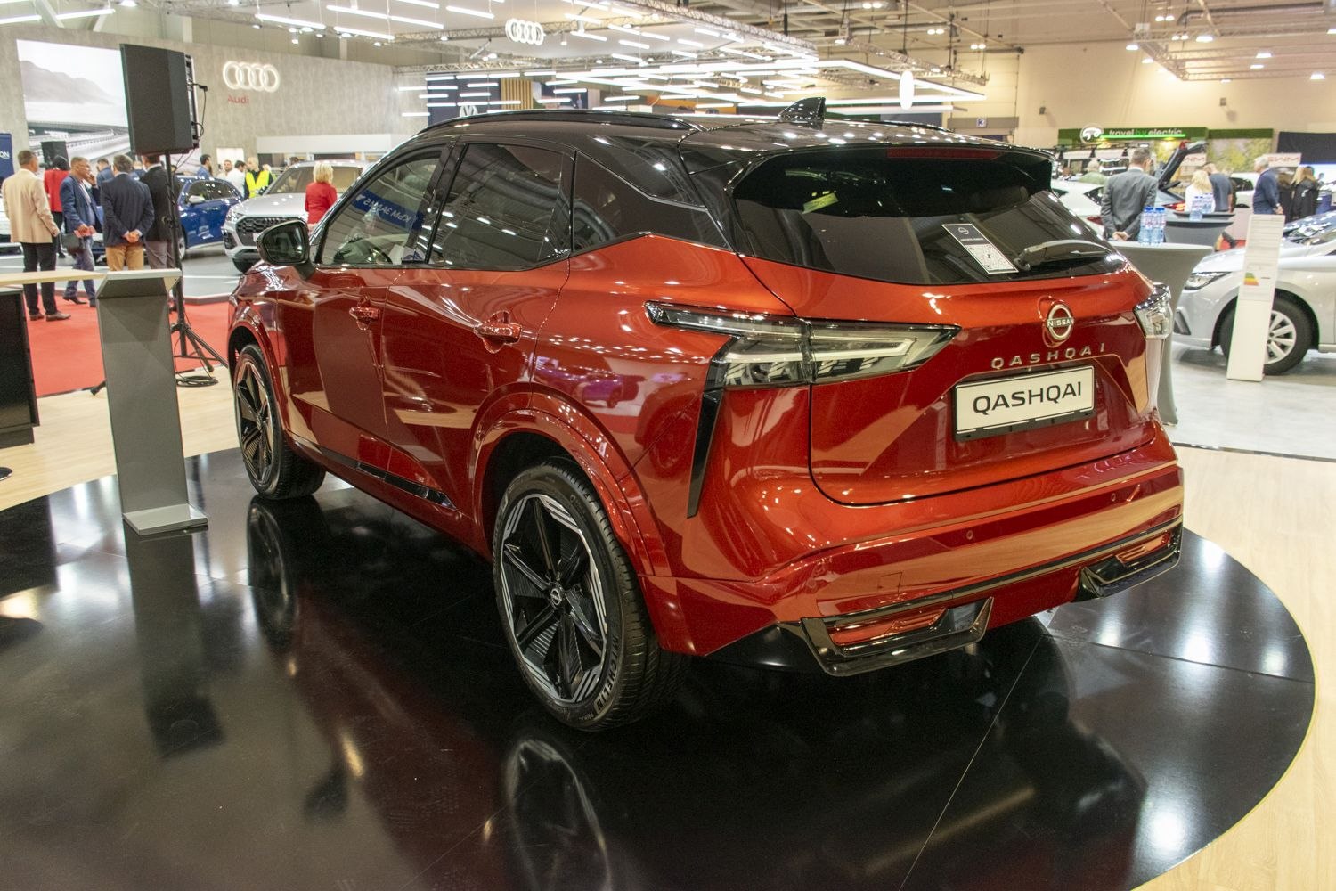 Rear view of modern SUV with sleek taillights and alloy wheels