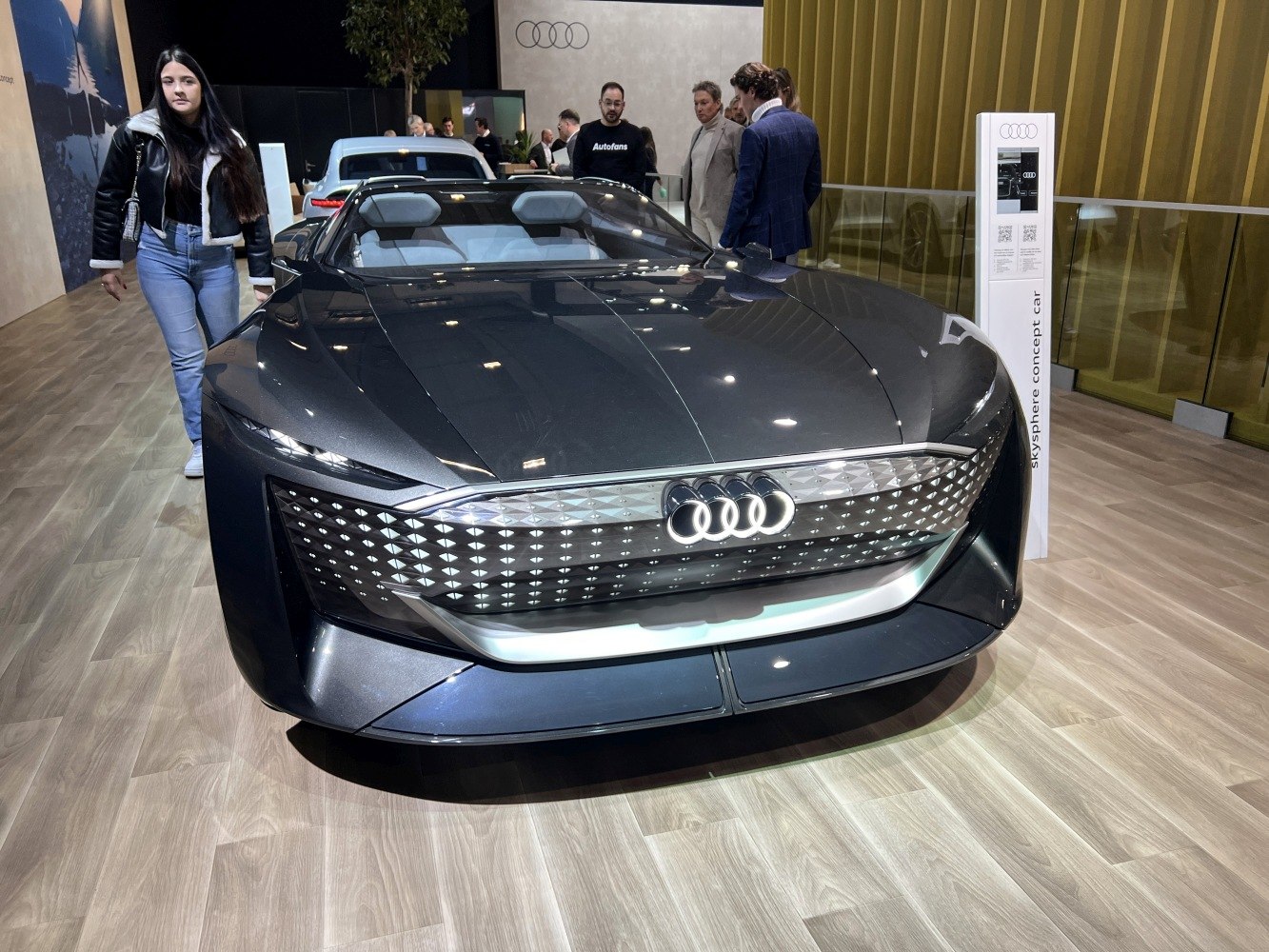 Front view with sleek grille and illuminated Audi rings