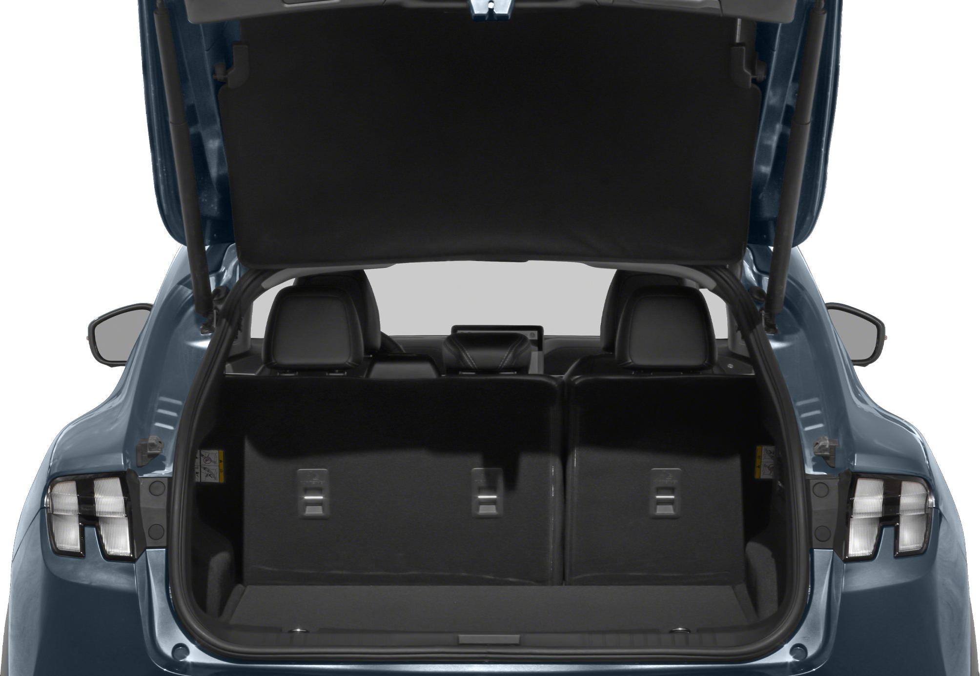 Open rear trunk with visible rear seats and taillights