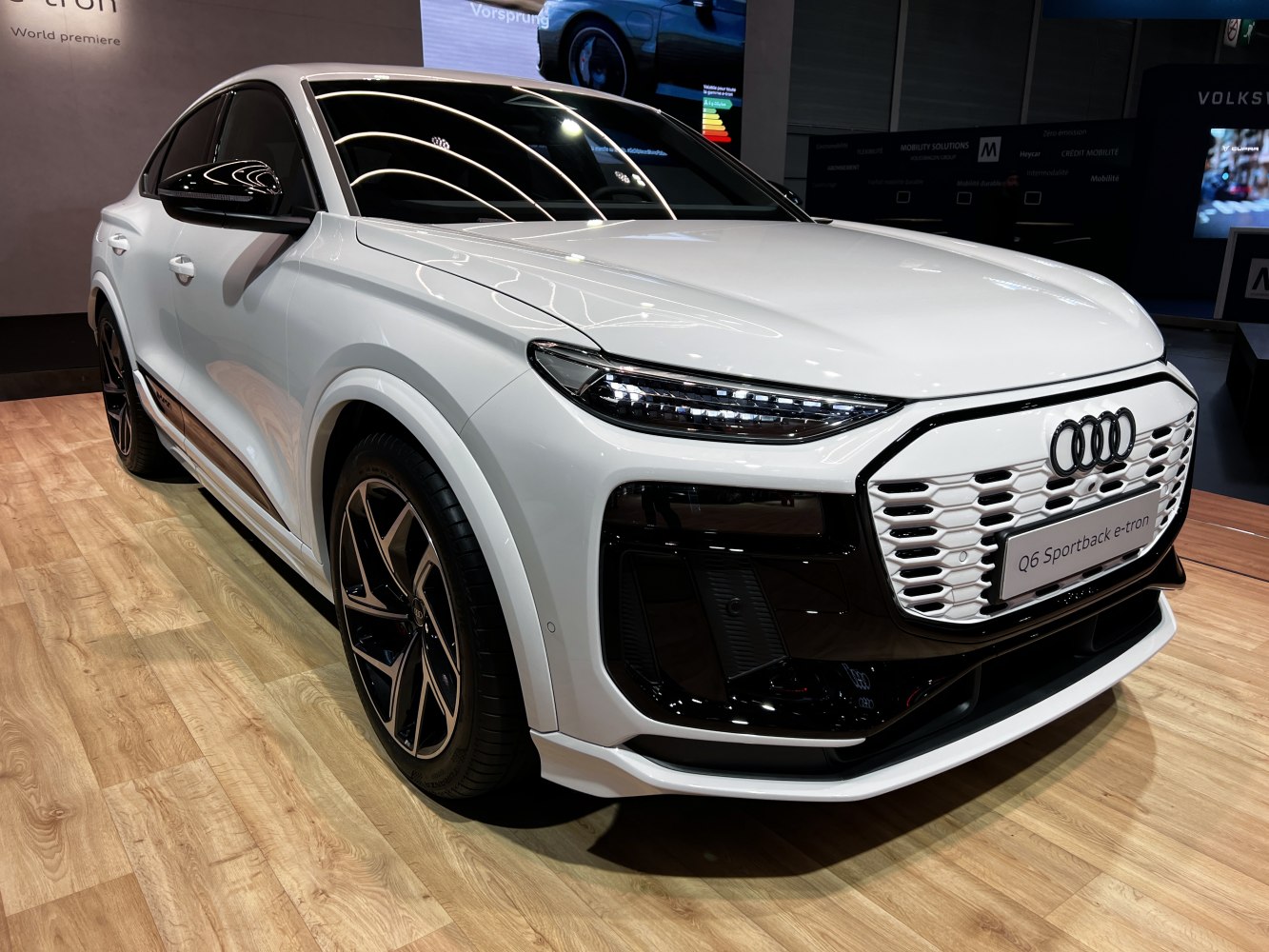 Angular LED headlights and futuristic grille front view